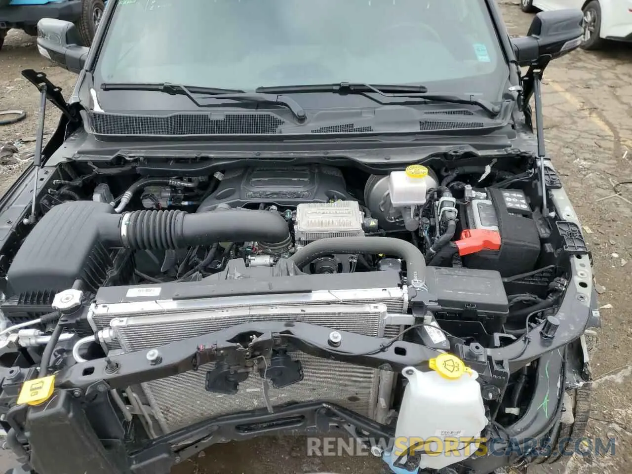 11 Photograph of a damaged car 1C6SRFFT2PN685089 RAM 1500 2023