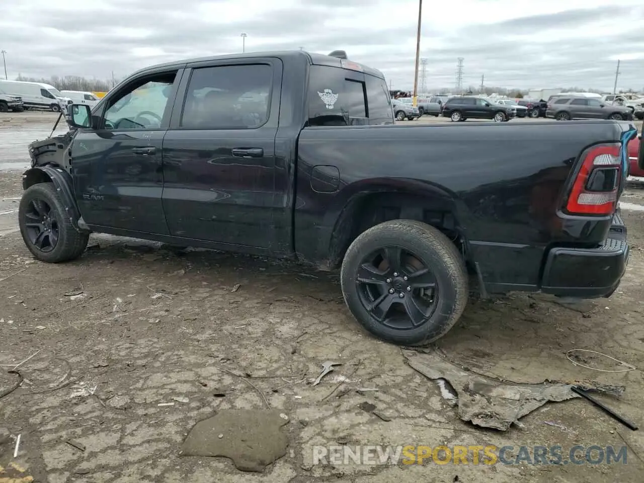2 Photograph of a damaged car 1C6SRFFT2PN685089 RAM 1500 2023