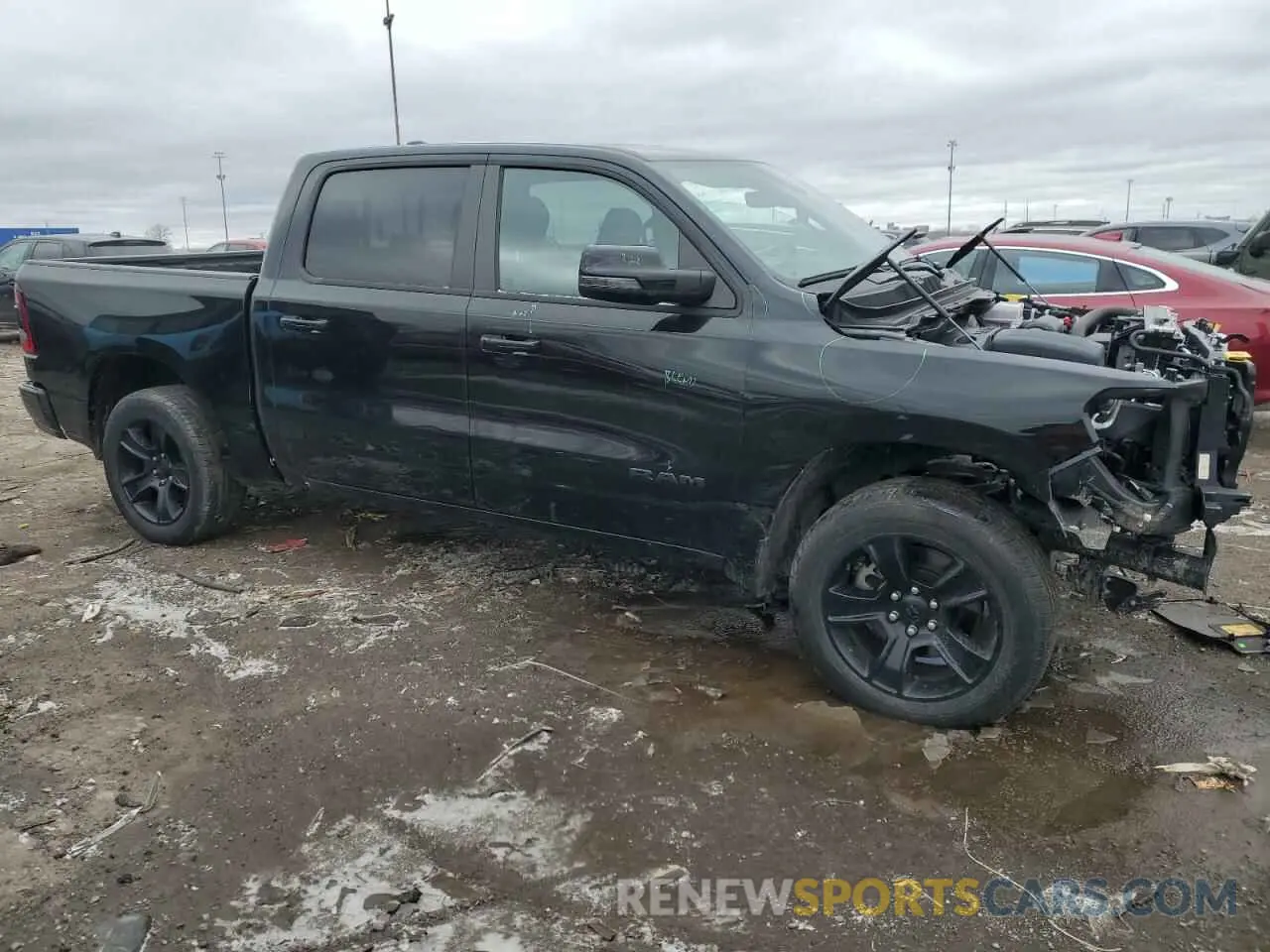4 Photograph of a damaged car 1C6SRFFT2PN685089 RAM 1500 2023