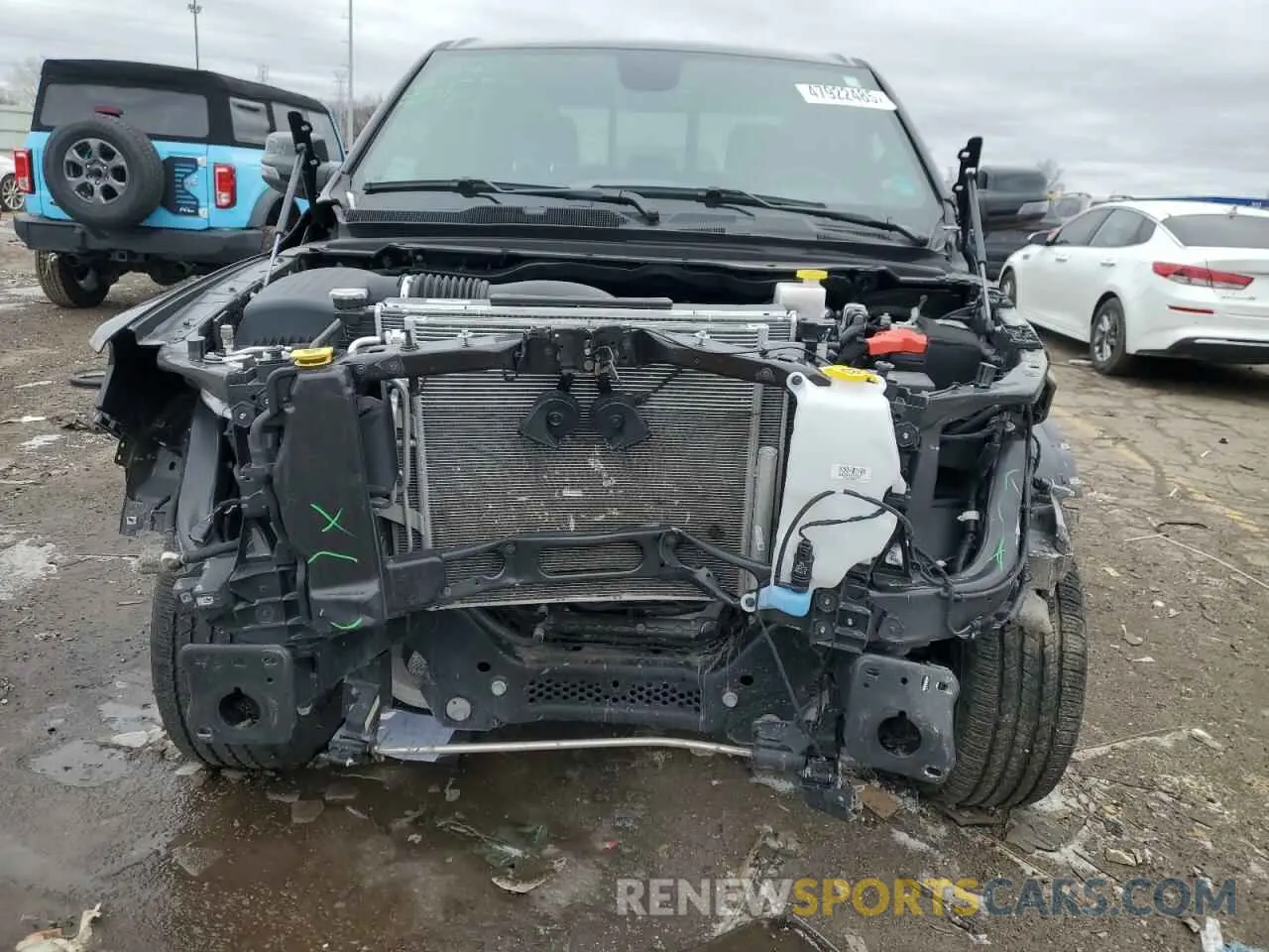5 Photograph of a damaged car 1C6SRFFT2PN685089 RAM 1500 2023