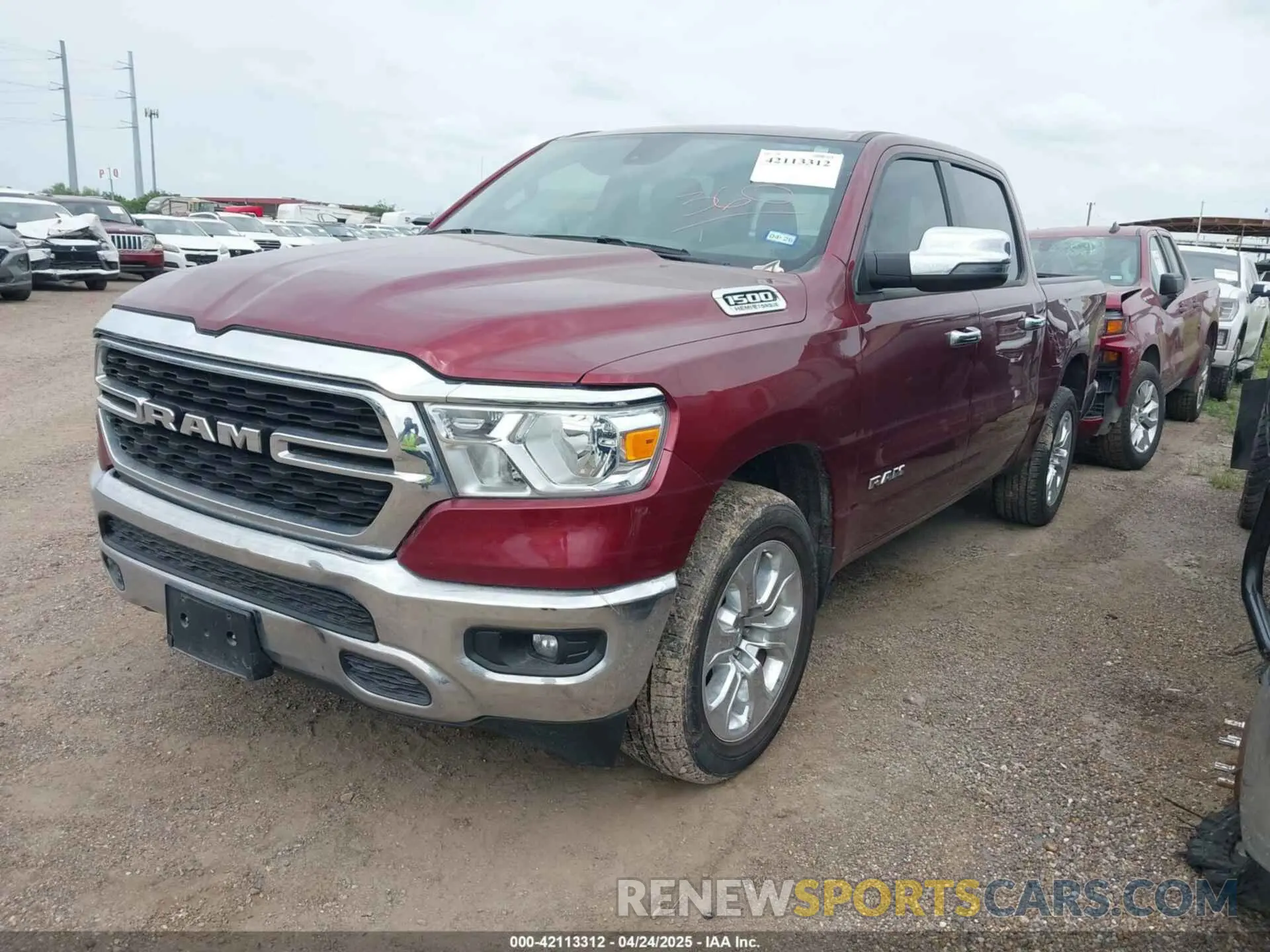 2 Photograph of a damaged car 1C6SRFFT2PN702988 RAM 1500 2023