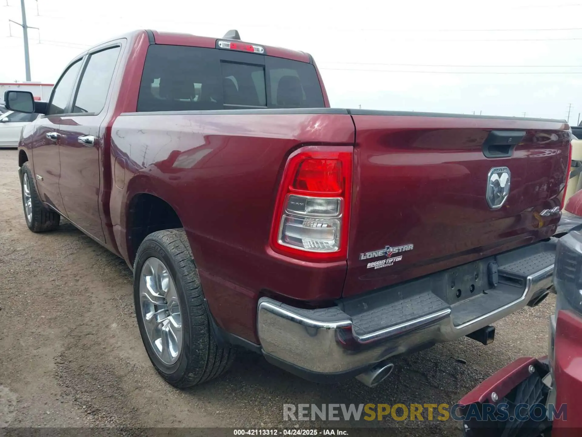 3 Photograph of a damaged car 1C6SRFFT2PN702988 RAM 1500 2023