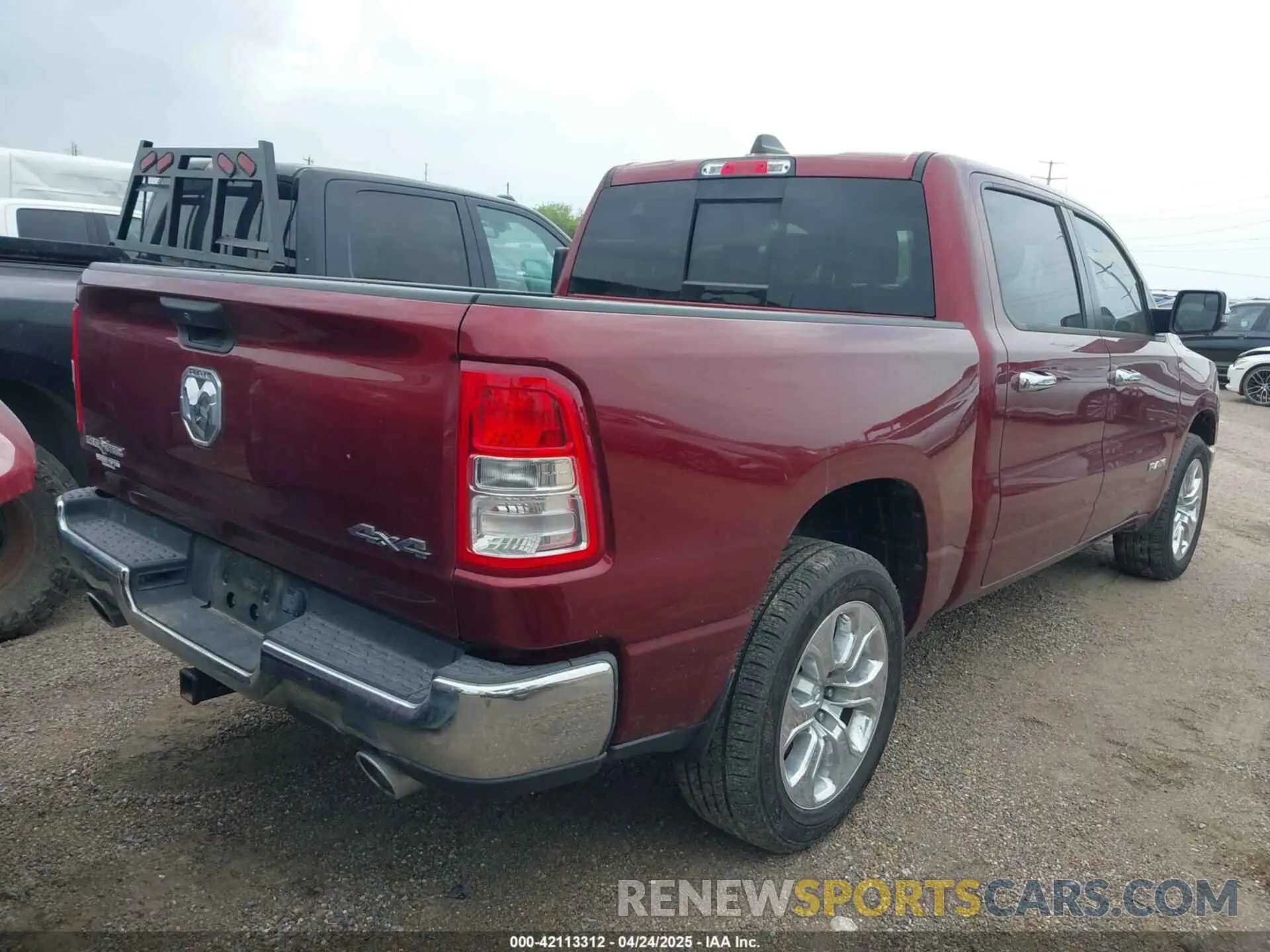 4 Photograph of a damaged car 1C6SRFFT2PN702988 RAM 1500 2023