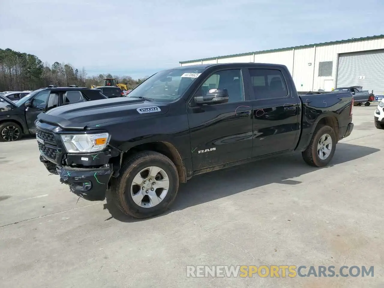 1 Photograph of a damaged car 1C6SRFFT2PN704790 RAM 1500 2023