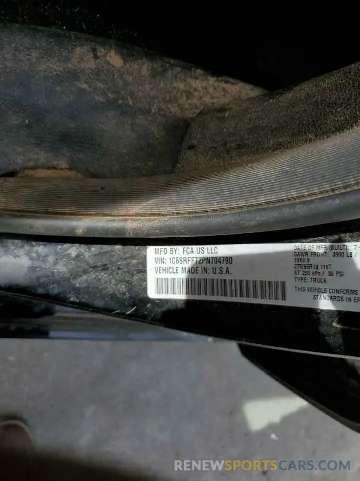 14 Photograph of a damaged car 1C6SRFFT2PN704790 RAM 1500 2023