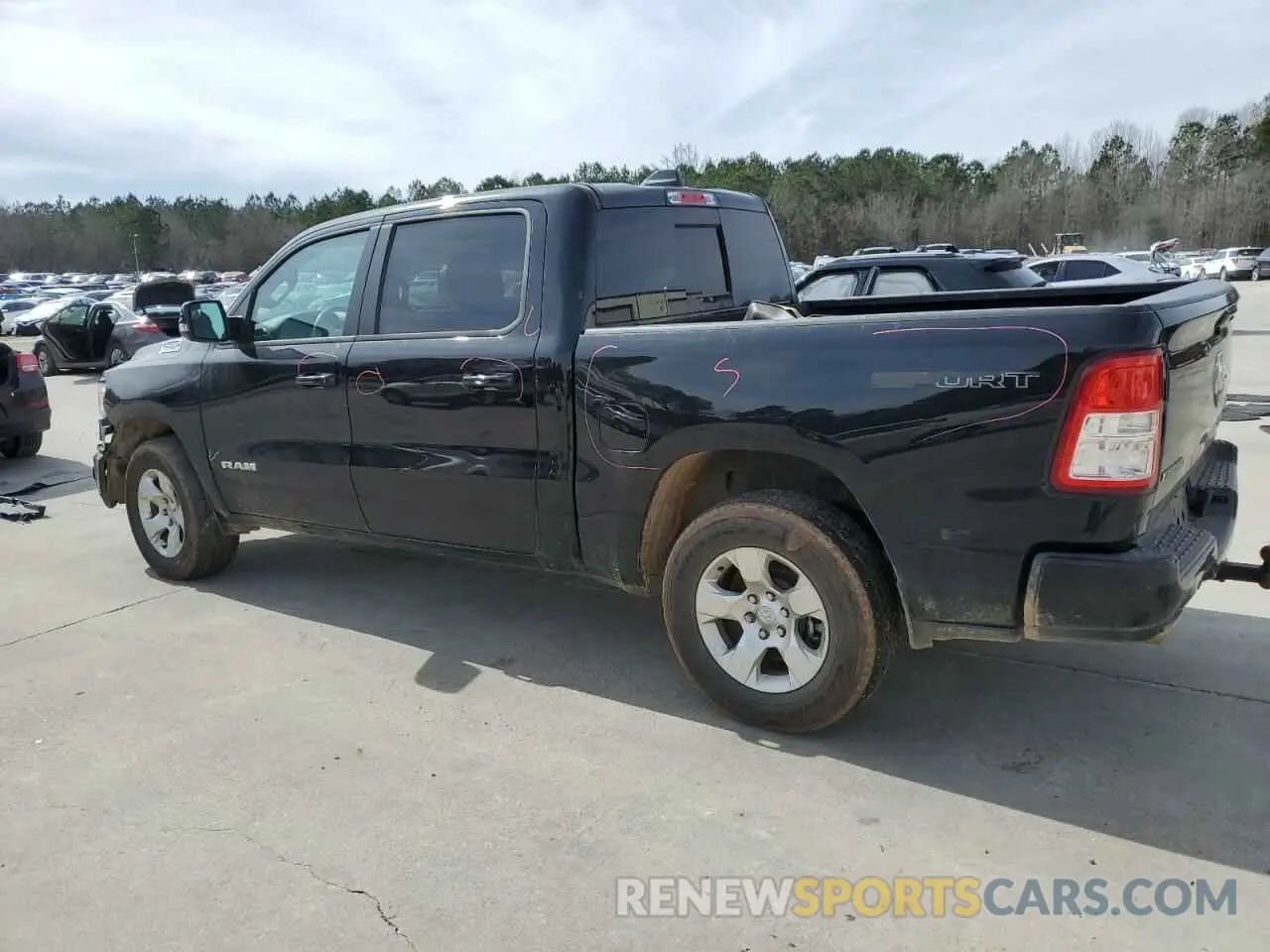 2 Photograph of a damaged car 1C6SRFFT2PN704790 RAM 1500 2023