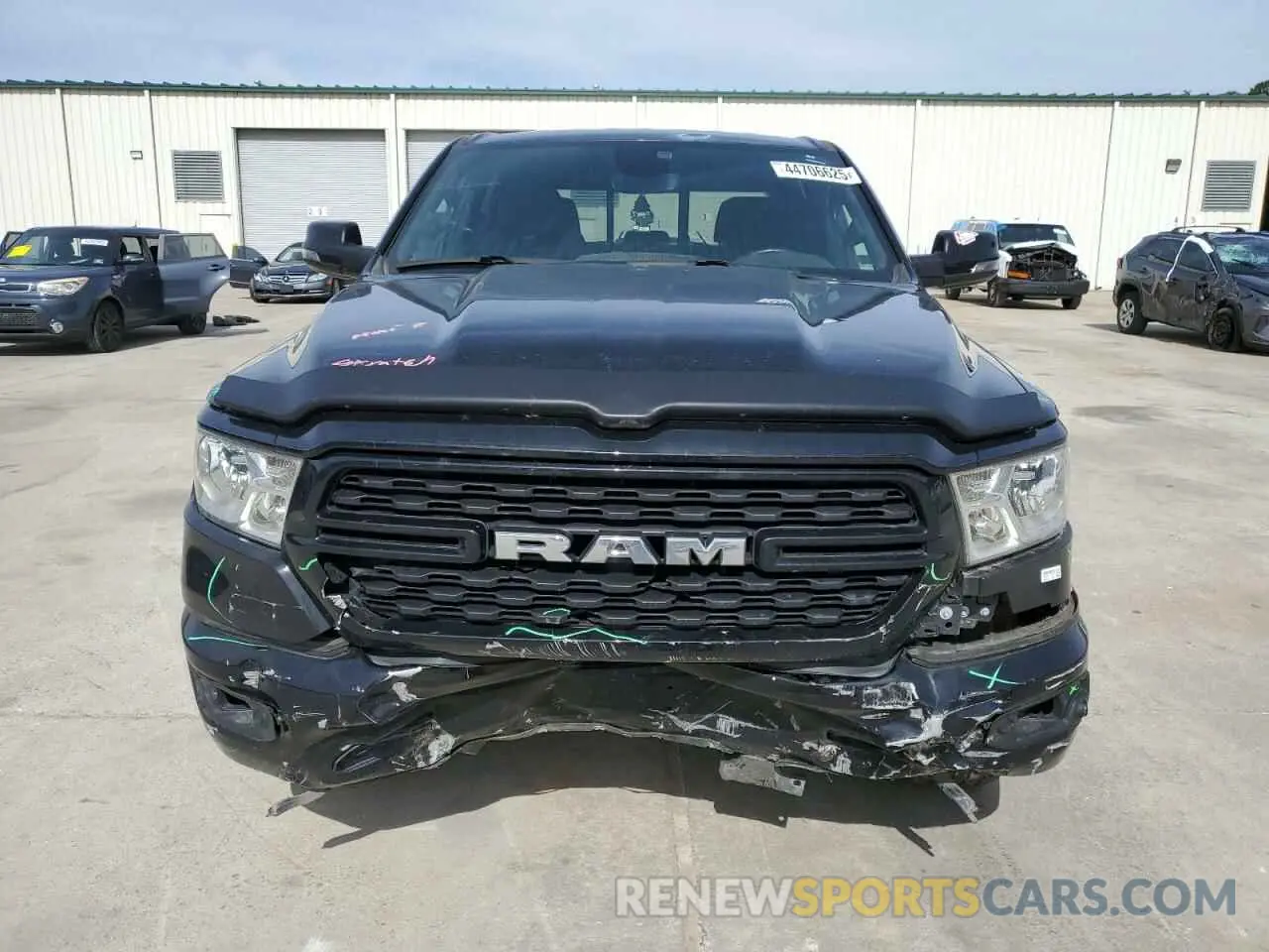 5 Photograph of a damaged car 1C6SRFFT2PN704790 RAM 1500 2023