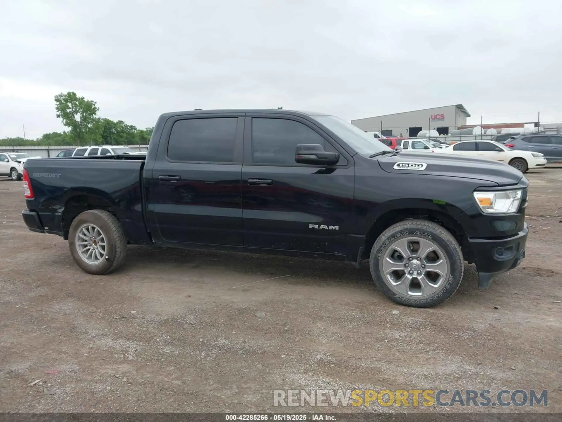 13 Photograph of a damaged car 1C6SRFFT3PN645572 RAM 1500 2023