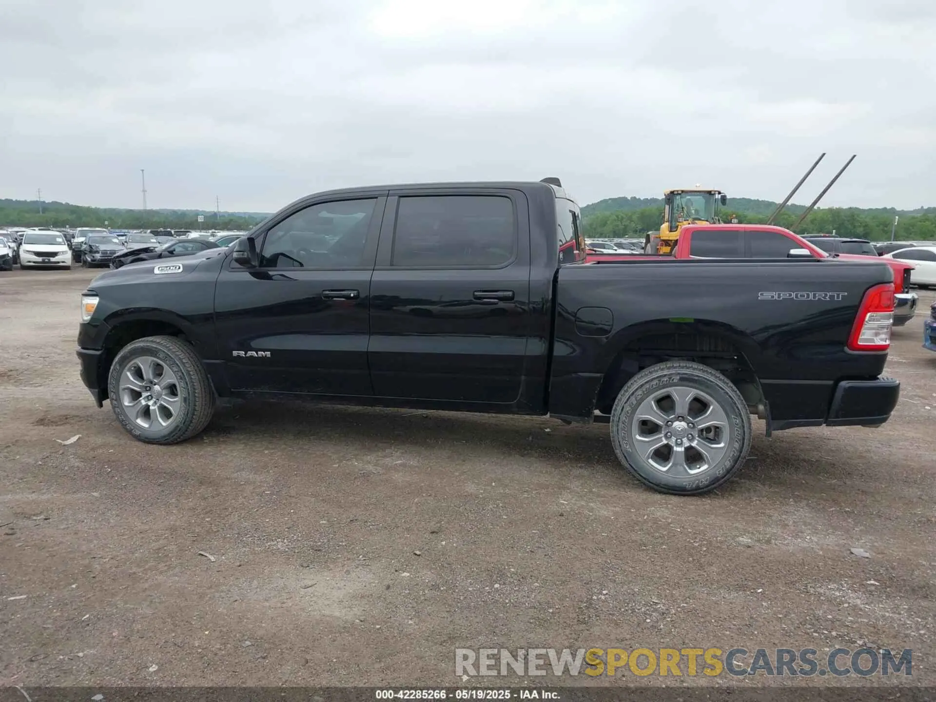 14 Photograph of a damaged car 1C6SRFFT3PN645572 RAM 1500 2023
