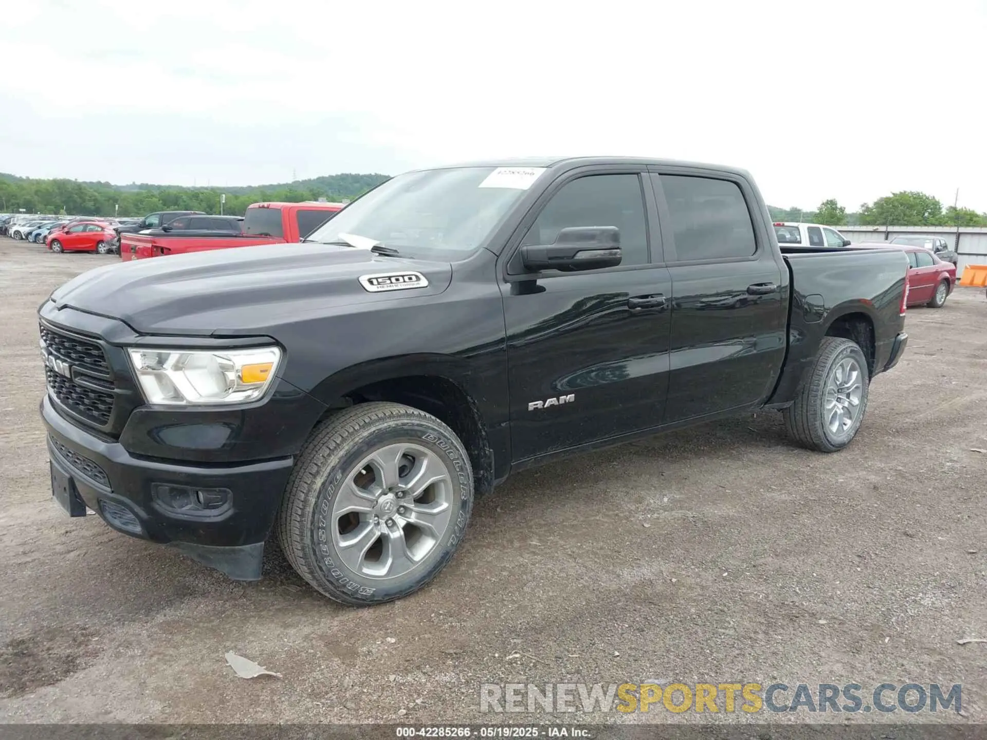 2 Photograph of a damaged car 1C6SRFFT3PN645572 RAM 1500 2023