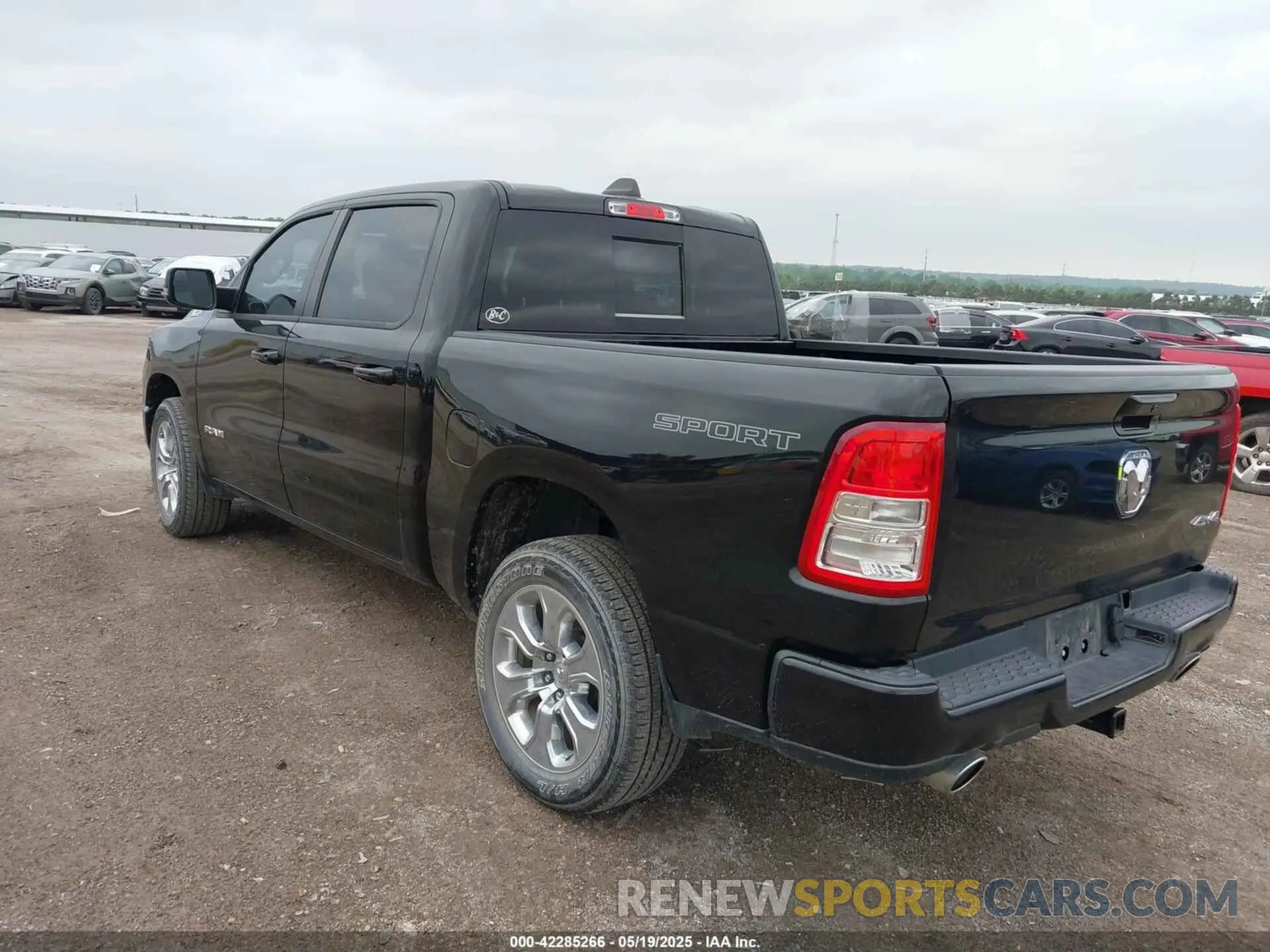 3 Photograph of a damaged car 1C6SRFFT3PN645572 RAM 1500 2023