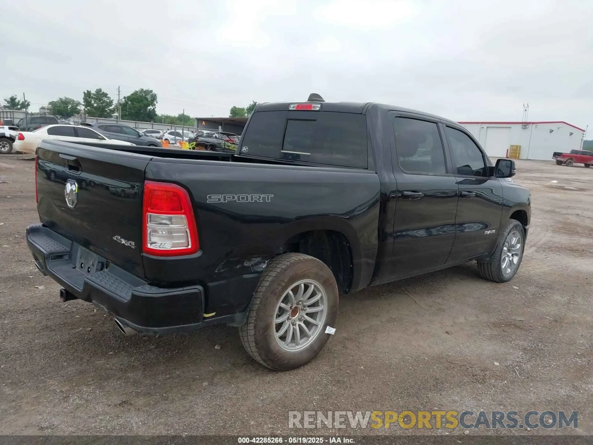 4 Photograph of a damaged car 1C6SRFFT3PN645572 RAM 1500 2023