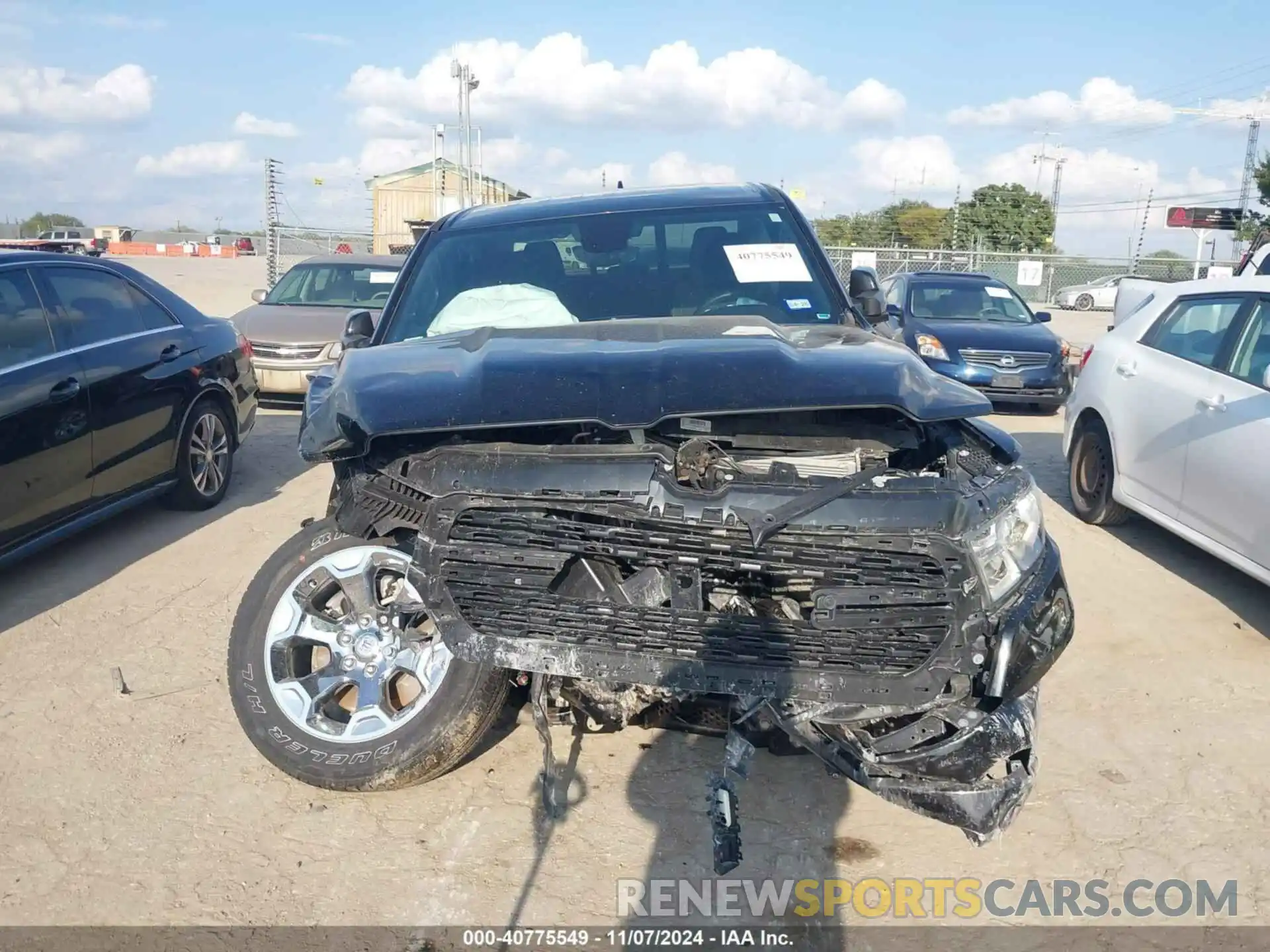 12 Photograph of a damaged car 1C6SRFFT3PN702899 RAM 1500 2023