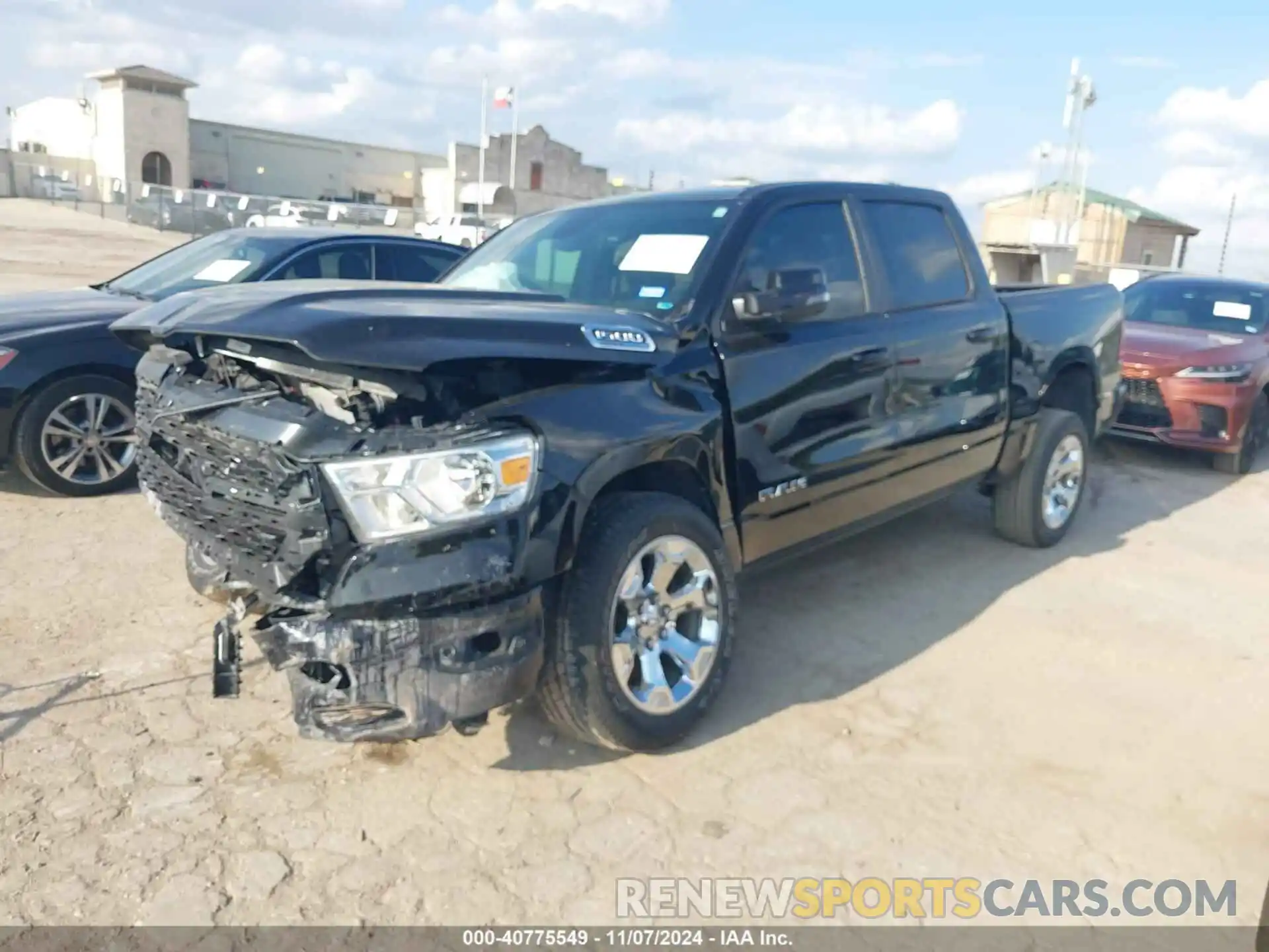 2 Photograph of a damaged car 1C6SRFFT3PN702899 RAM 1500 2023