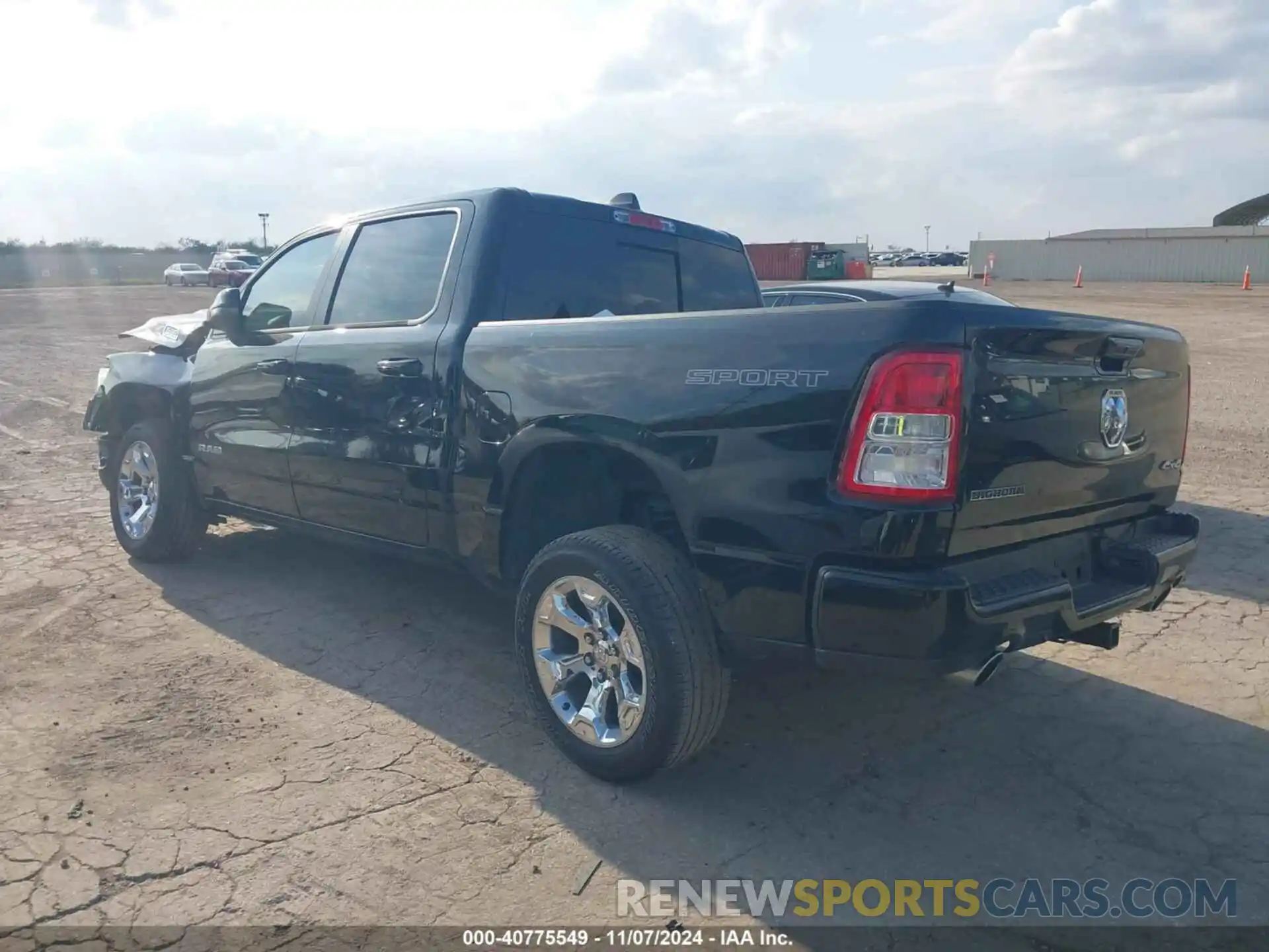 3 Photograph of a damaged car 1C6SRFFT3PN702899 RAM 1500 2023