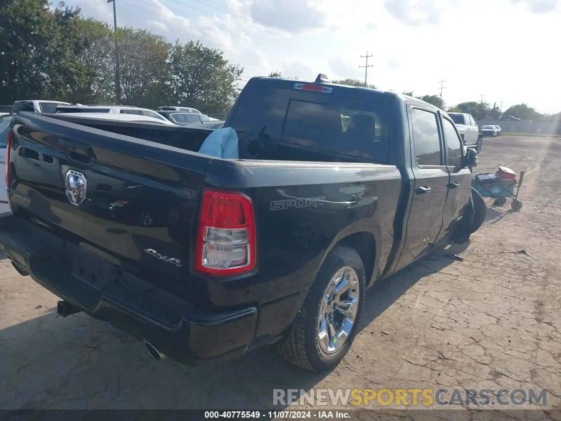 4 Photograph of a damaged car 1C6SRFFT3PN702899 RAM 1500 2023