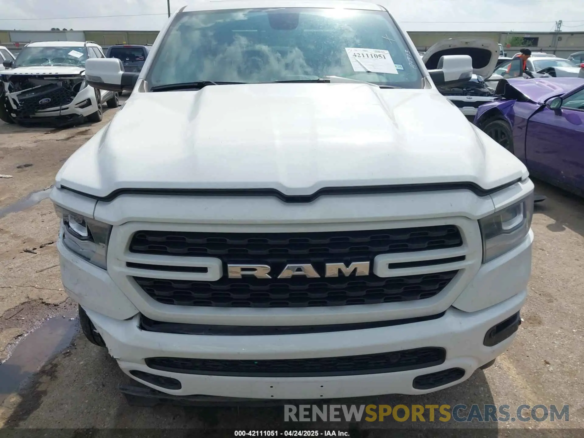 11 Photograph of a damaged car 1C6SRFFT4PN532343 RAM 1500 2023