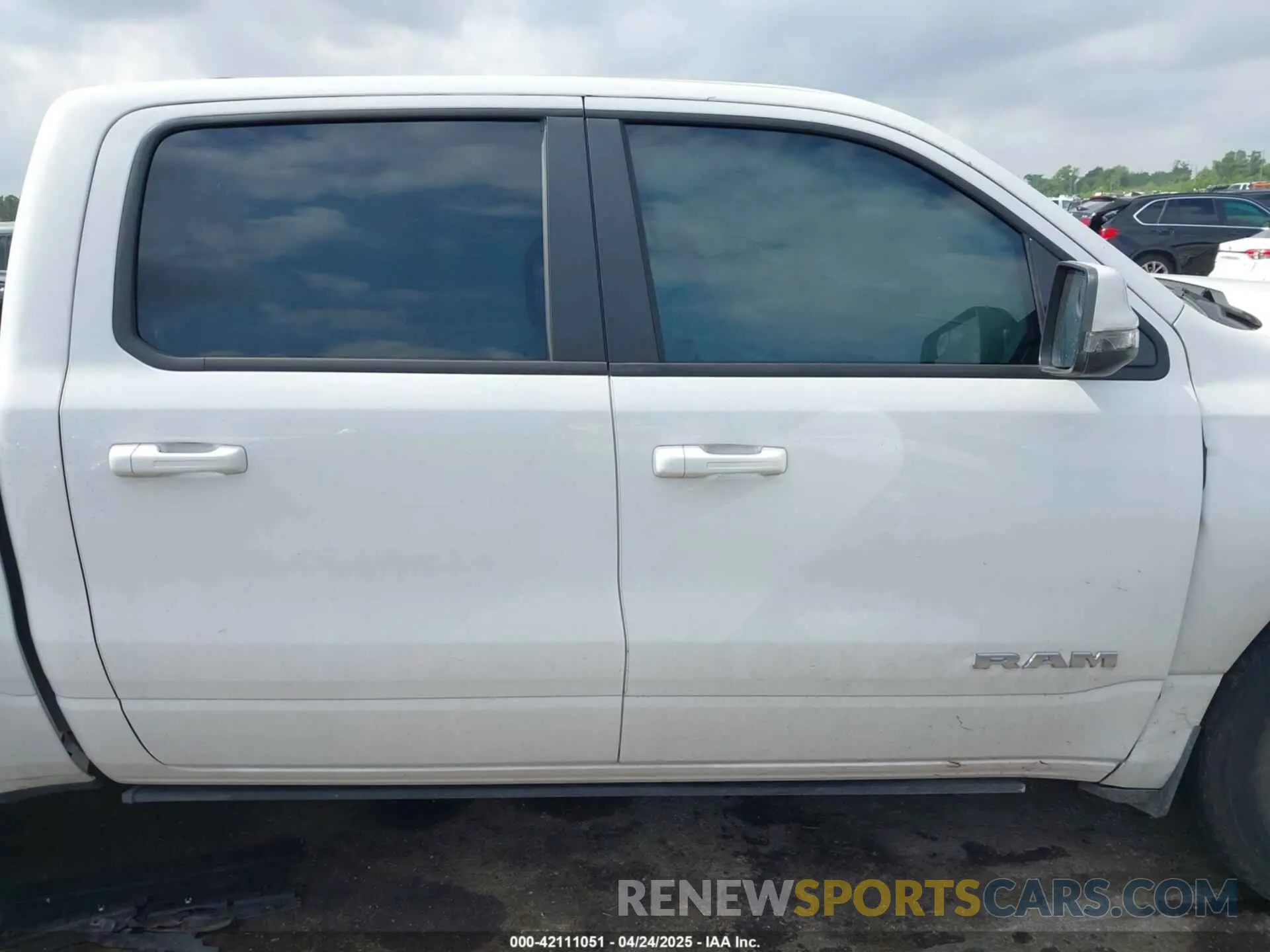 12 Photograph of a damaged car 1C6SRFFT4PN532343 RAM 1500 2023