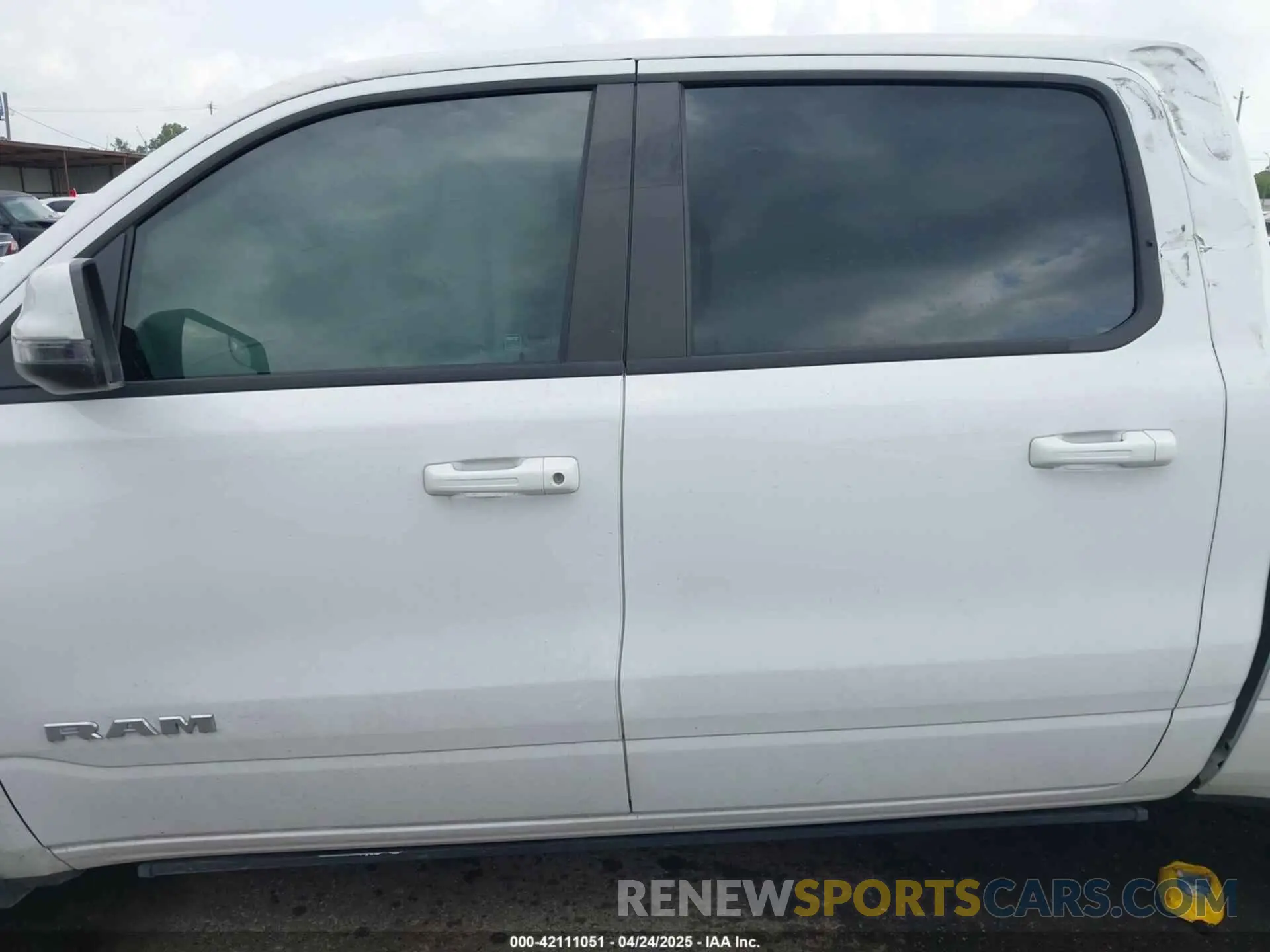 13 Photograph of a damaged car 1C6SRFFT4PN532343 RAM 1500 2023