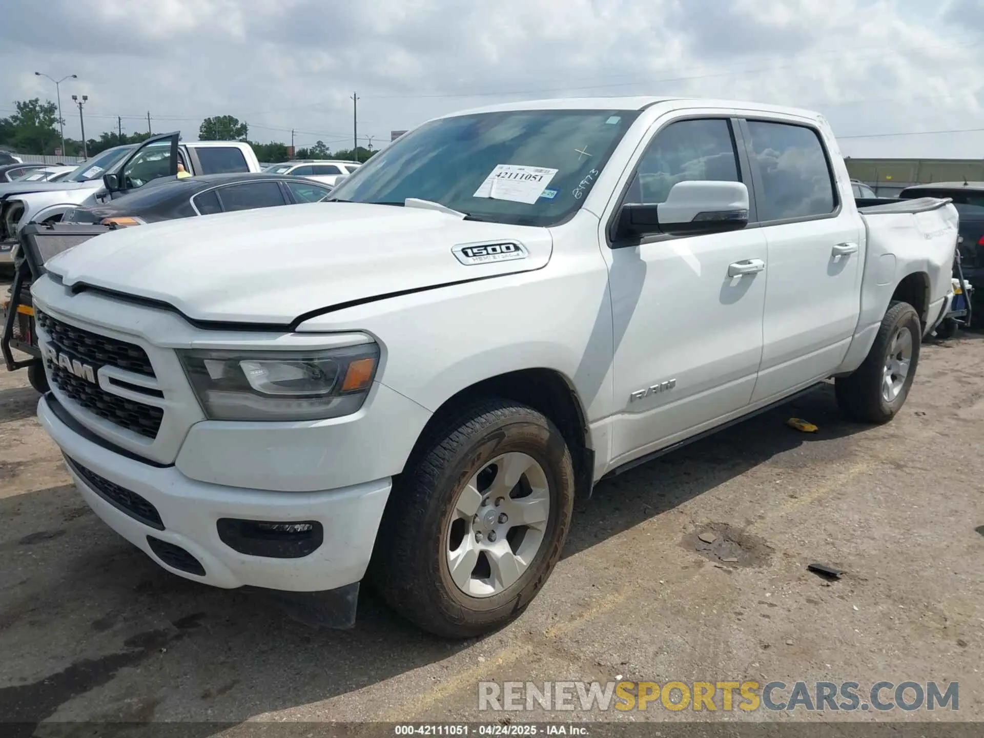 2 Photograph of a damaged car 1C6SRFFT4PN532343 RAM 1500 2023