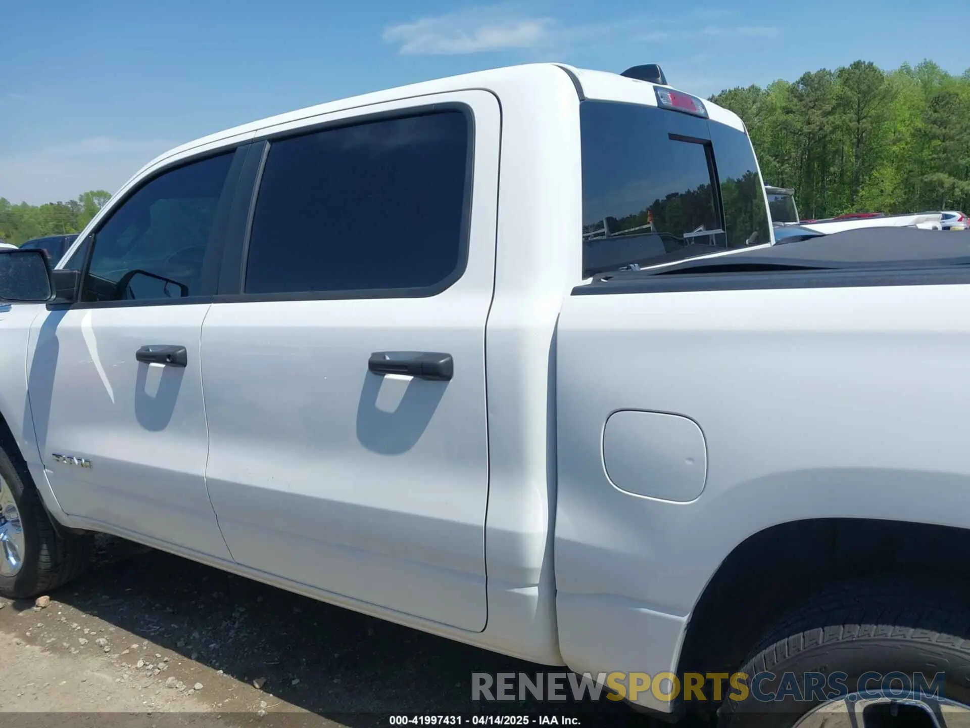 14 Photograph of a damaged car 1C6SRFFT4PN561888 RAM 1500 2023