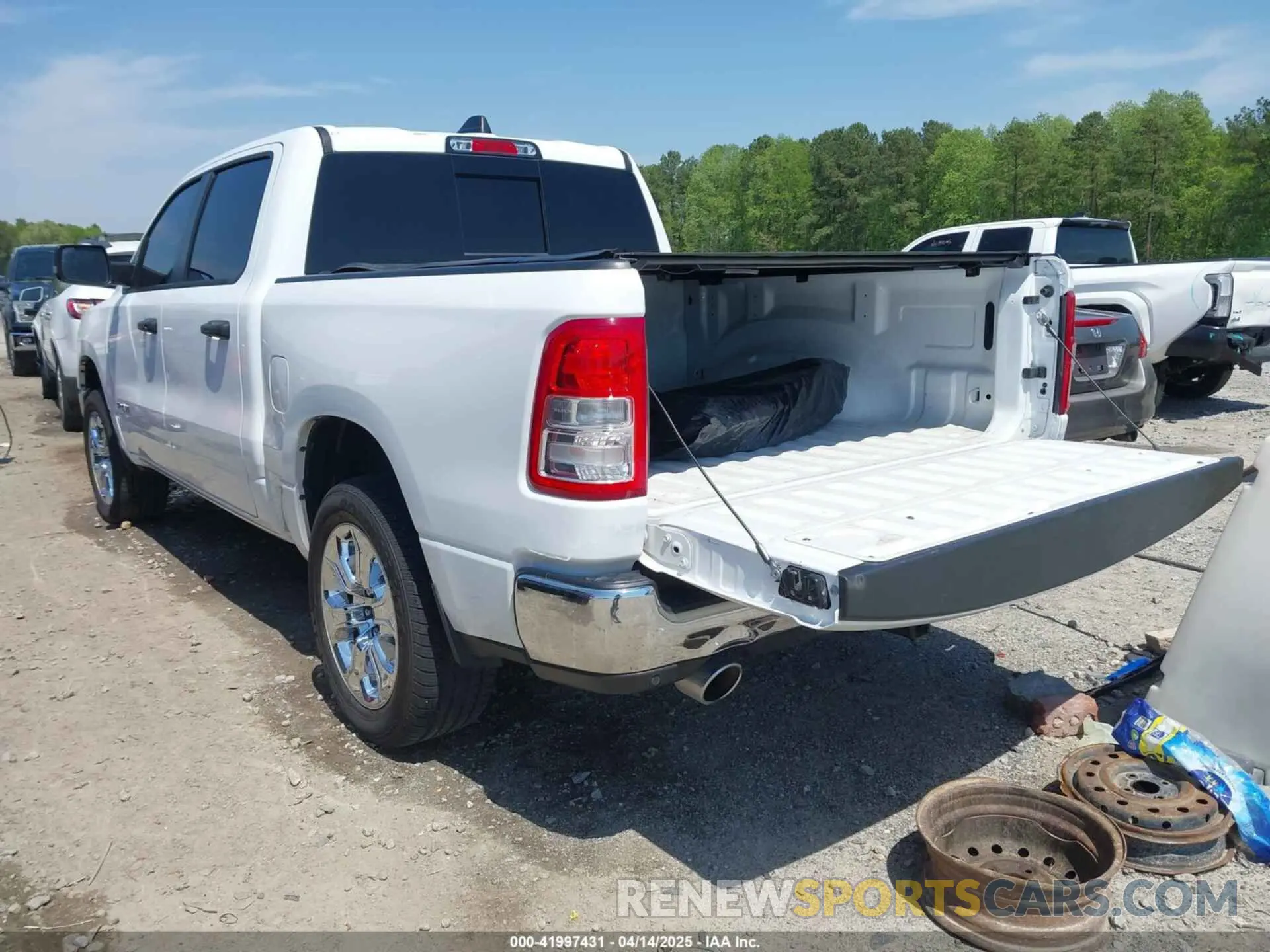 3 Photograph of a damaged car 1C6SRFFT4PN561888 RAM 1500 2023