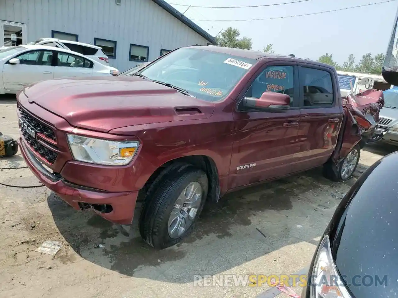 1 Photograph of a damaged car 1C6SRFFT4PN646276 RAM 1500 2023