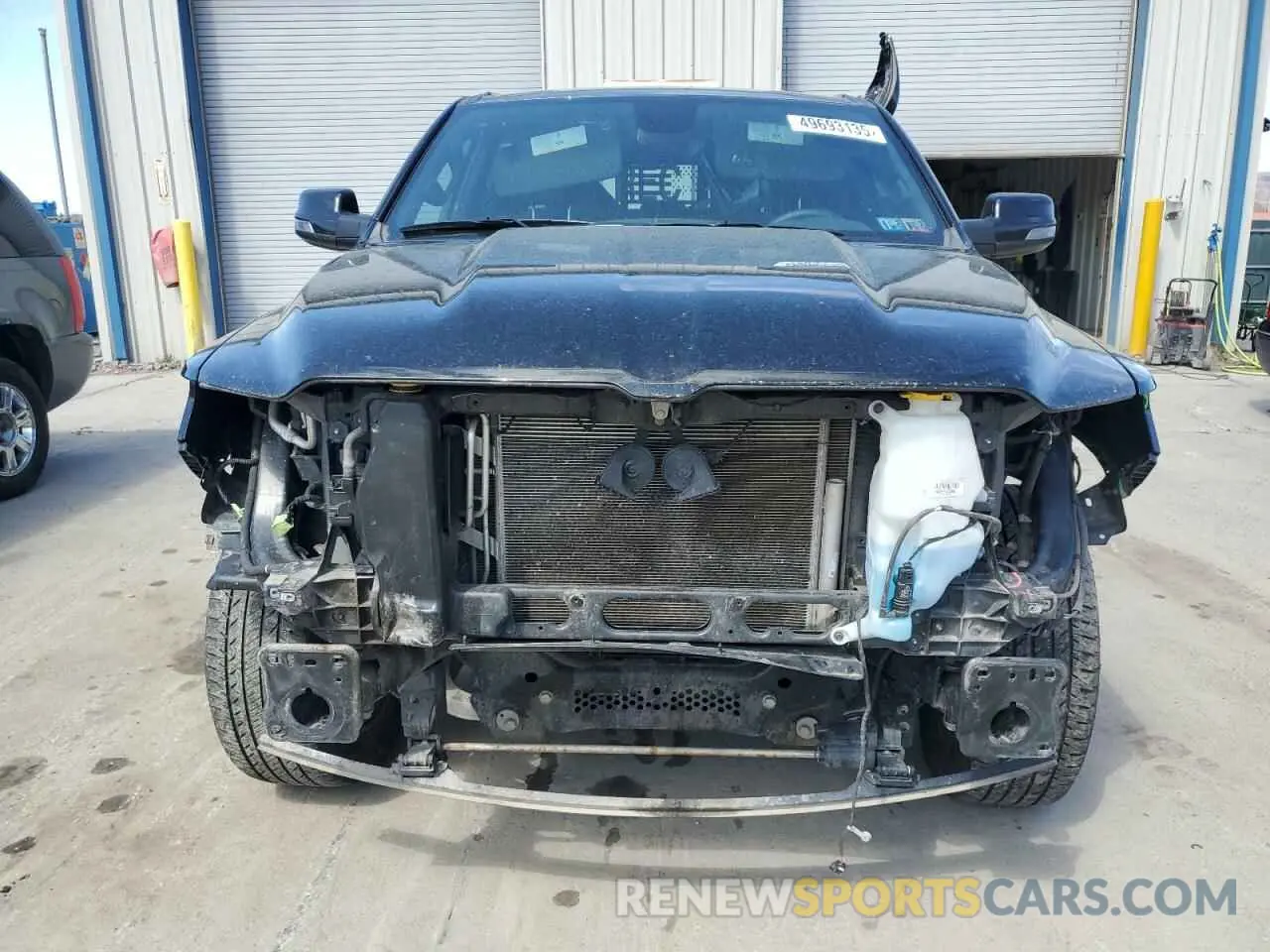 5 Photograph of a damaged car 1C6SRFFT4PN678323 RAM 1500 2023