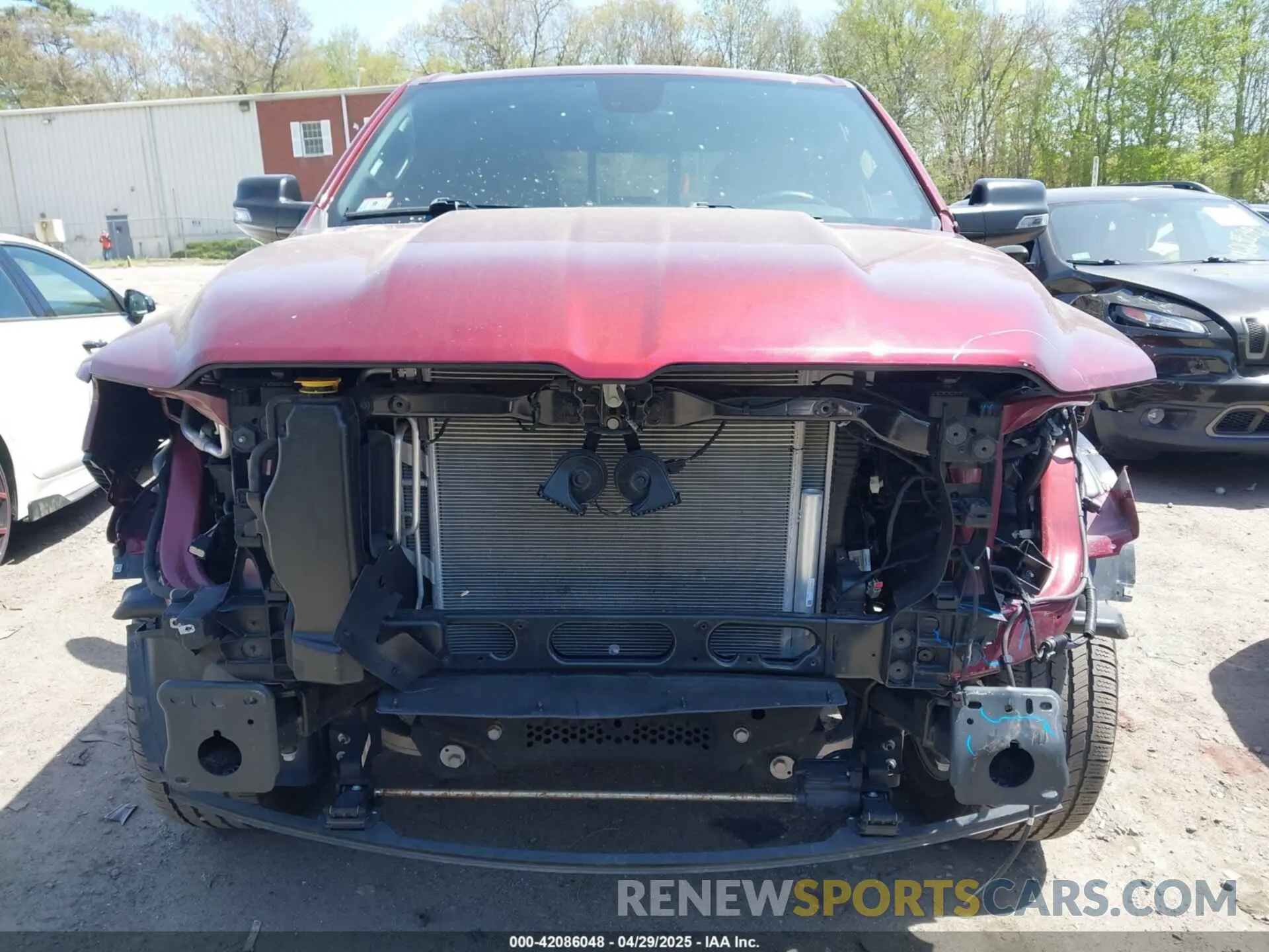 12 Photograph of a damaged car 1C6SRFFT4PN688110 RAM 1500 2023