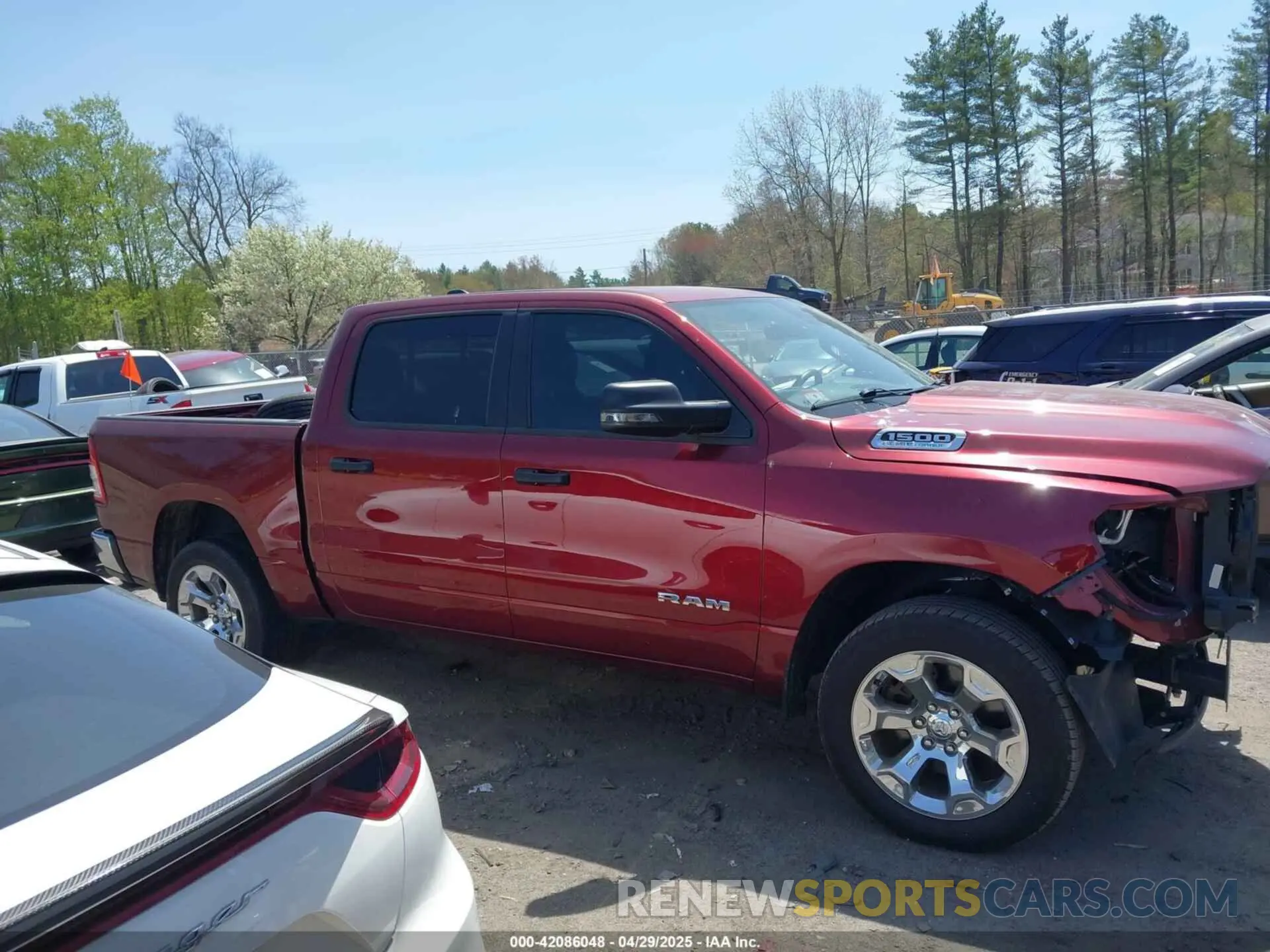 13 Photograph of a damaged car 1C6SRFFT4PN688110 RAM 1500 2023