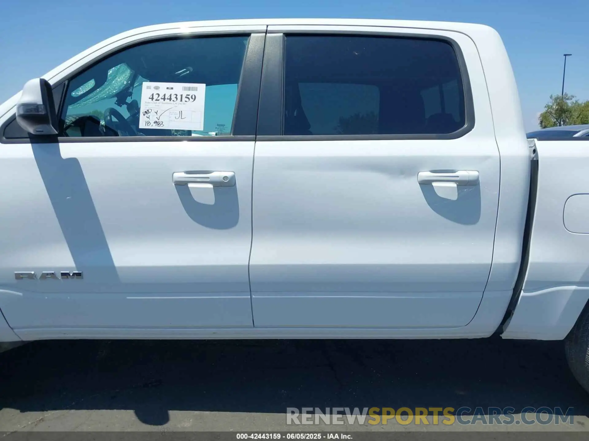 14 Photograph of a damaged car 1C6SRFFT5PN655973 RAM 1500 2023