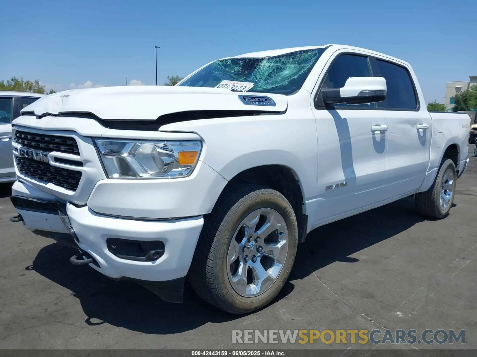2 Photograph of a damaged car 1C6SRFFT5PN655973 RAM 1500 2023