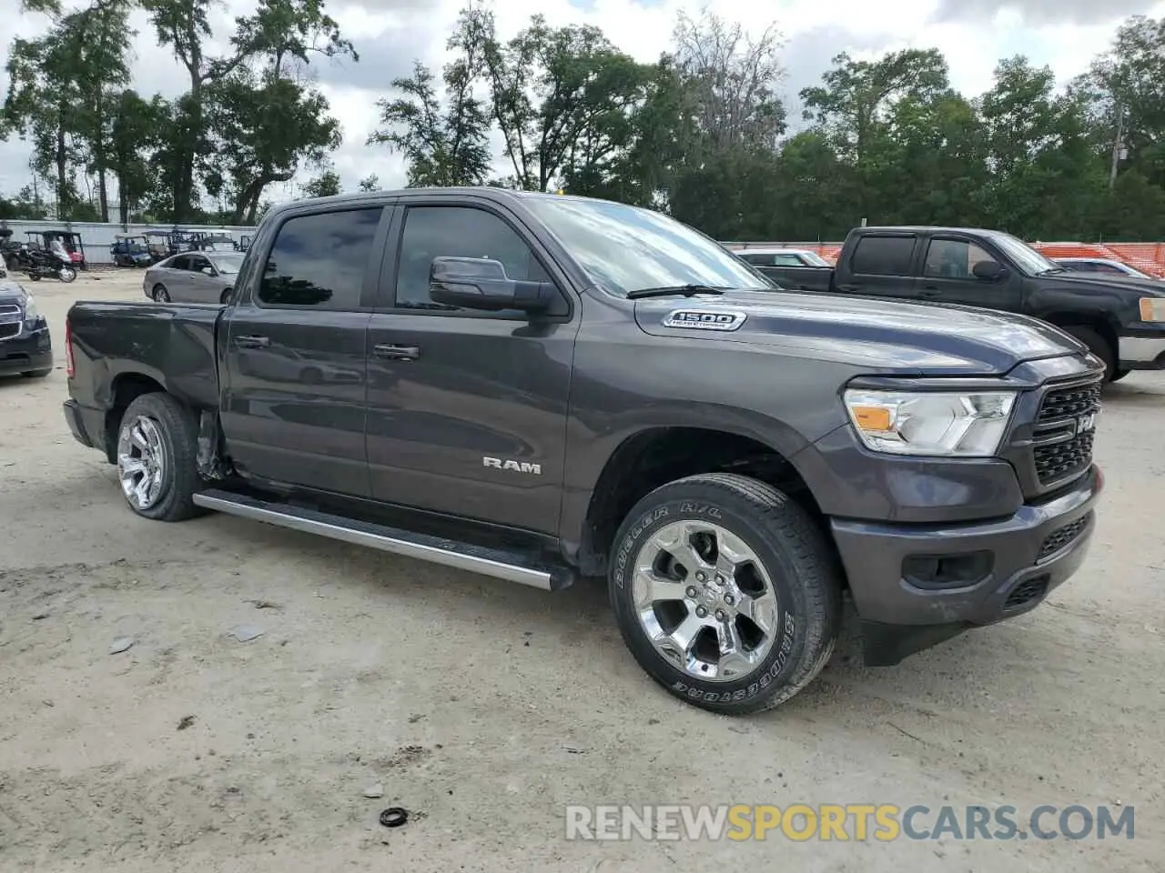 4 Photograph of a damaged car 1C6SRFFT5PN700801 RAM 1500 2023