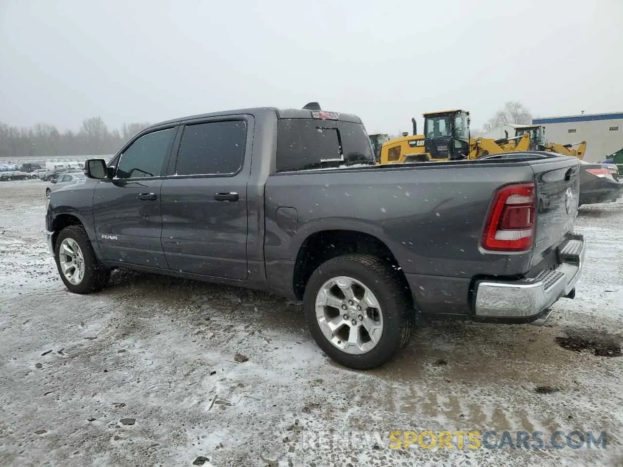 2 Photograph of a damaged car 1C6SRFFT5PN704962 RAM 1500 2023