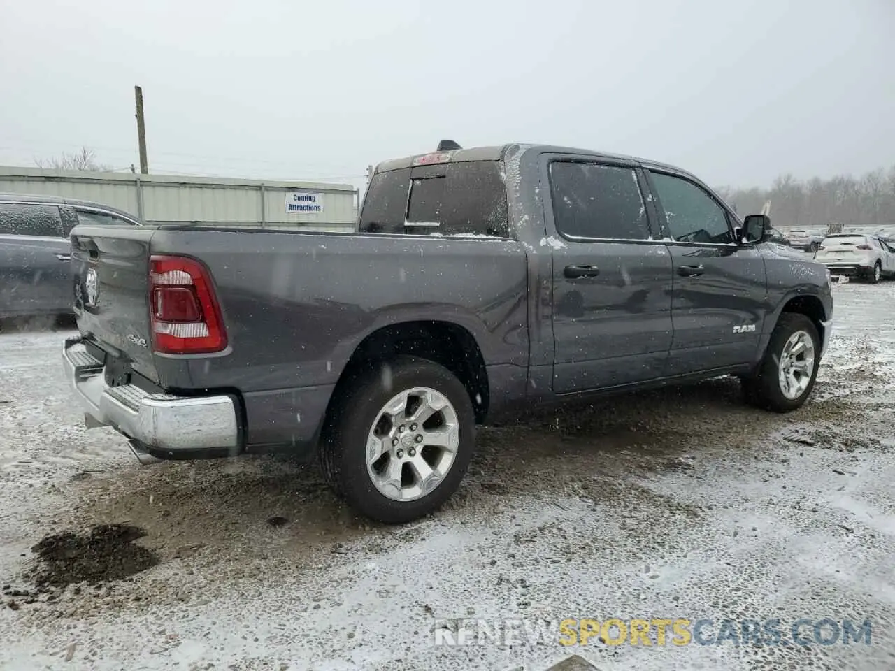 3 Photograph of a damaged car 1C6SRFFT5PN704962 RAM 1500 2023