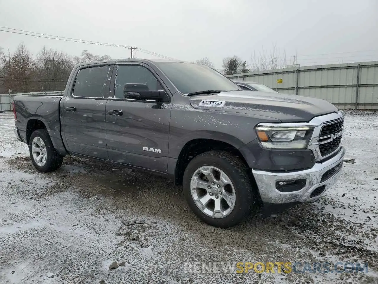 4 Photograph of a damaged car 1C6SRFFT5PN704962 RAM 1500 2023