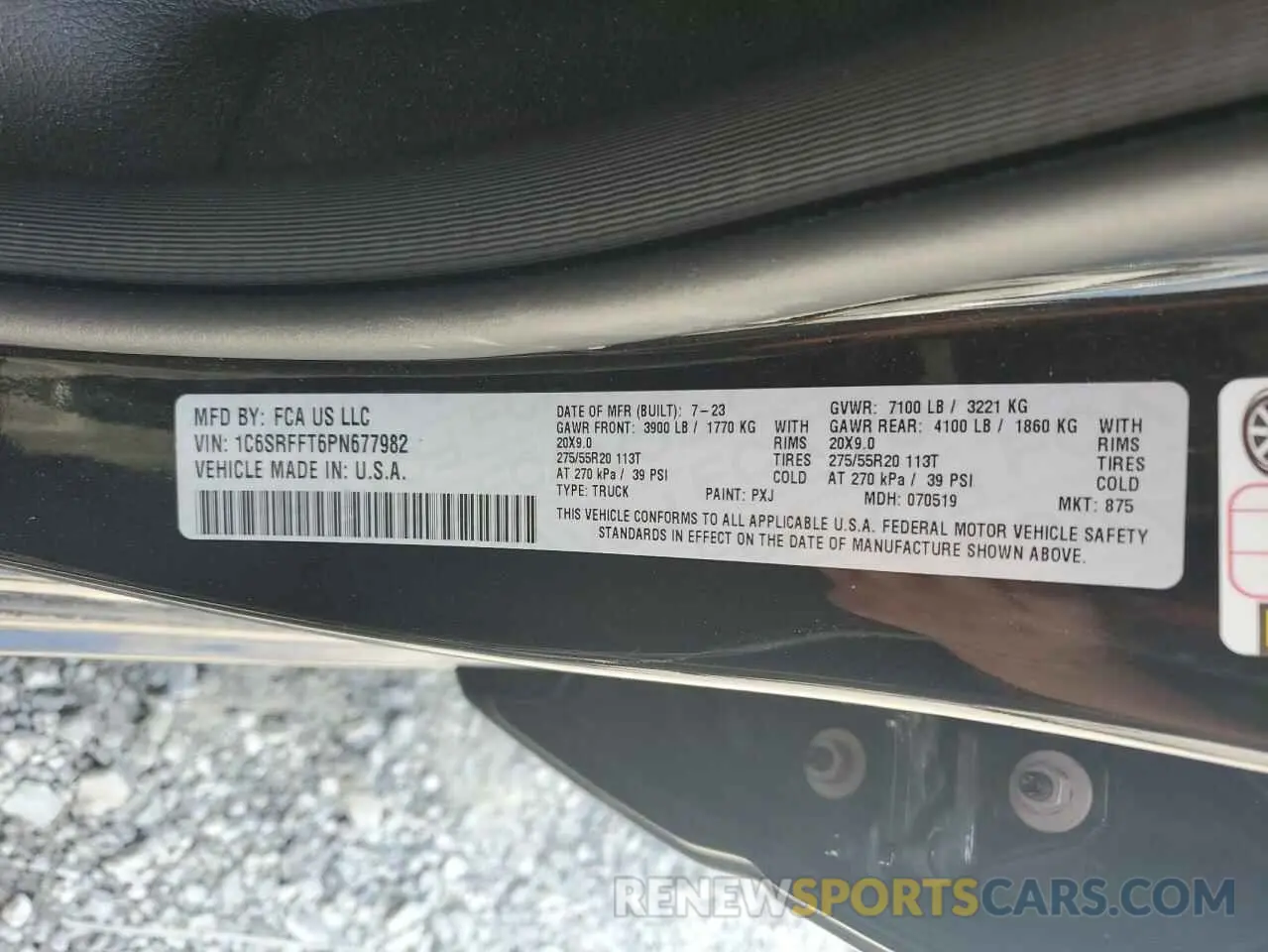 12 Photograph of a damaged car 1C6SRFFT6PN677982 RAM 1500 2023