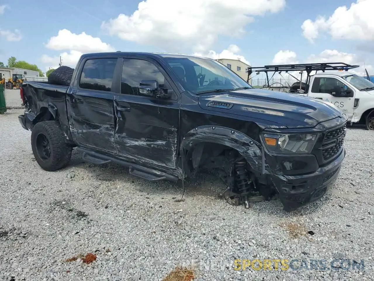 4 Photograph of a damaged car 1C6SRFFT6PN677982 RAM 1500 2023