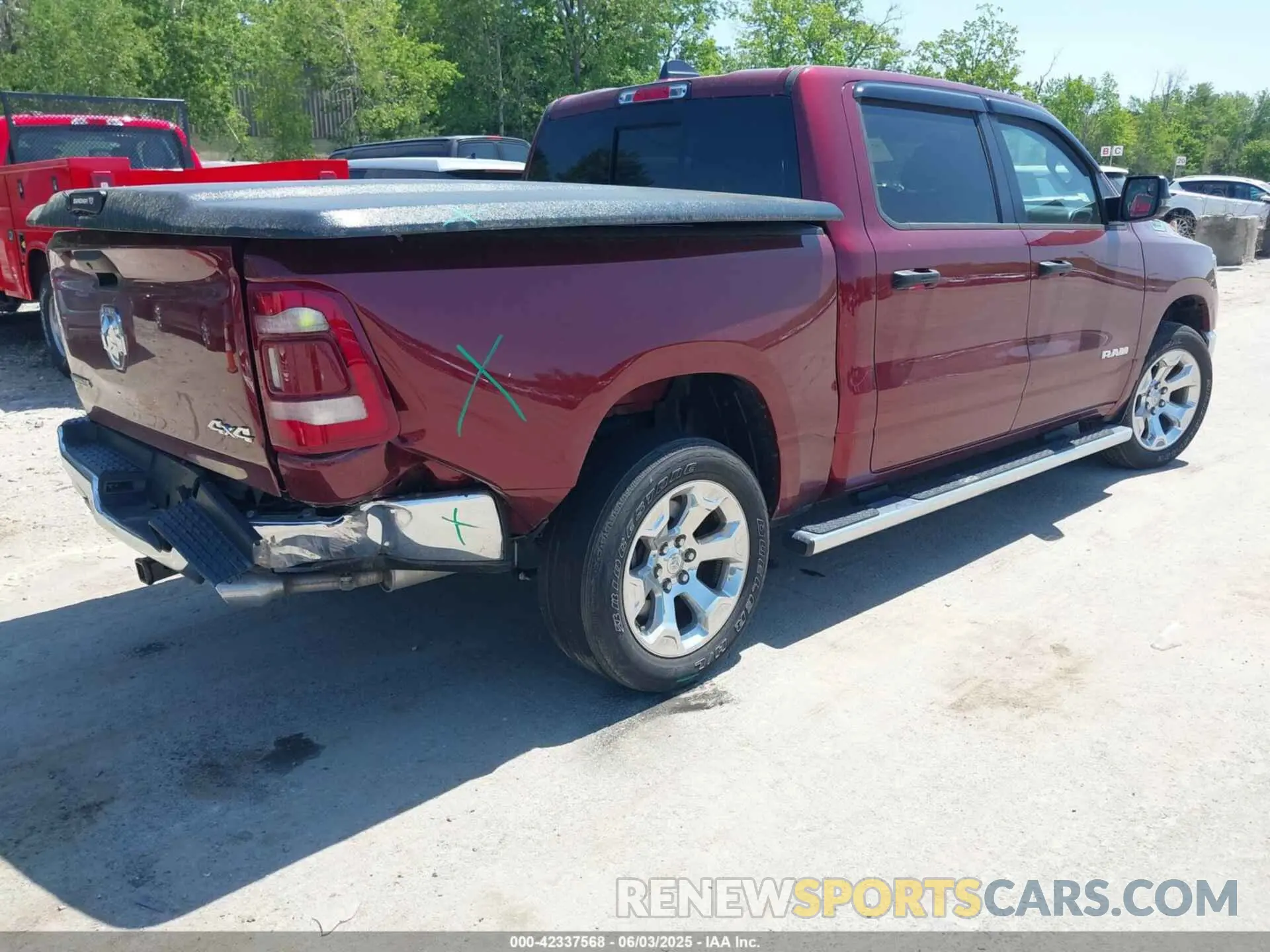 4 Photograph of a damaged car 1C6SRFFT6PN685743 RAM 1500 2023