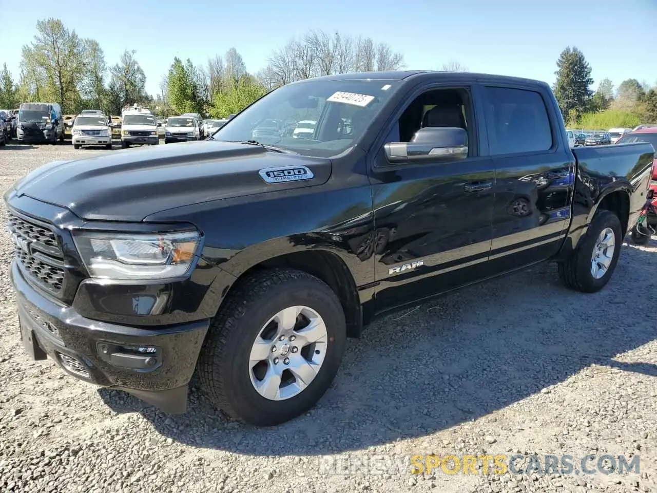 1 Photograph of a damaged car 1C6SRFFT7PN602921 RAM 1500 2023