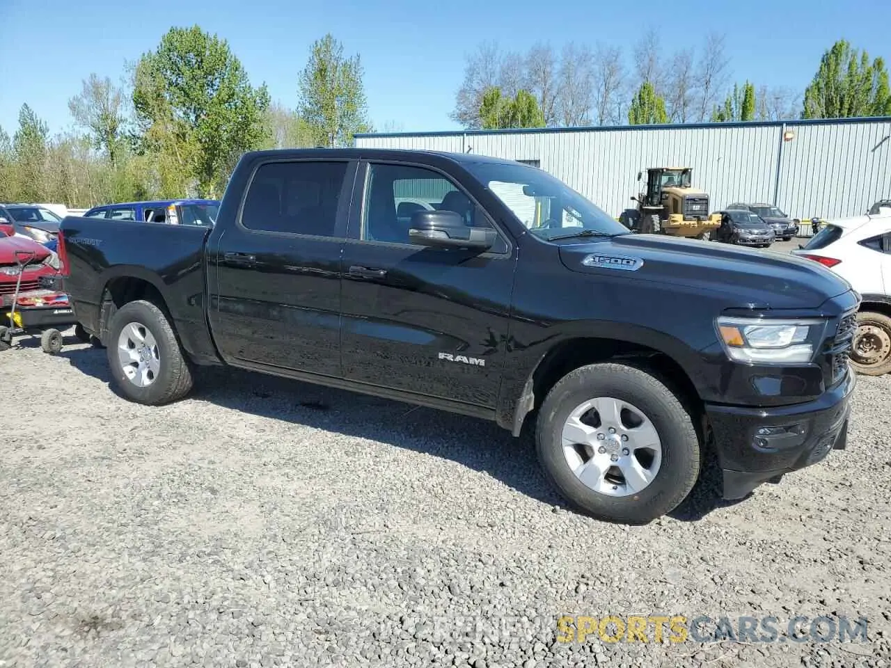 4 Photograph of a damaged car 1C6SRFFT7PN602921 RAM 1500 2023