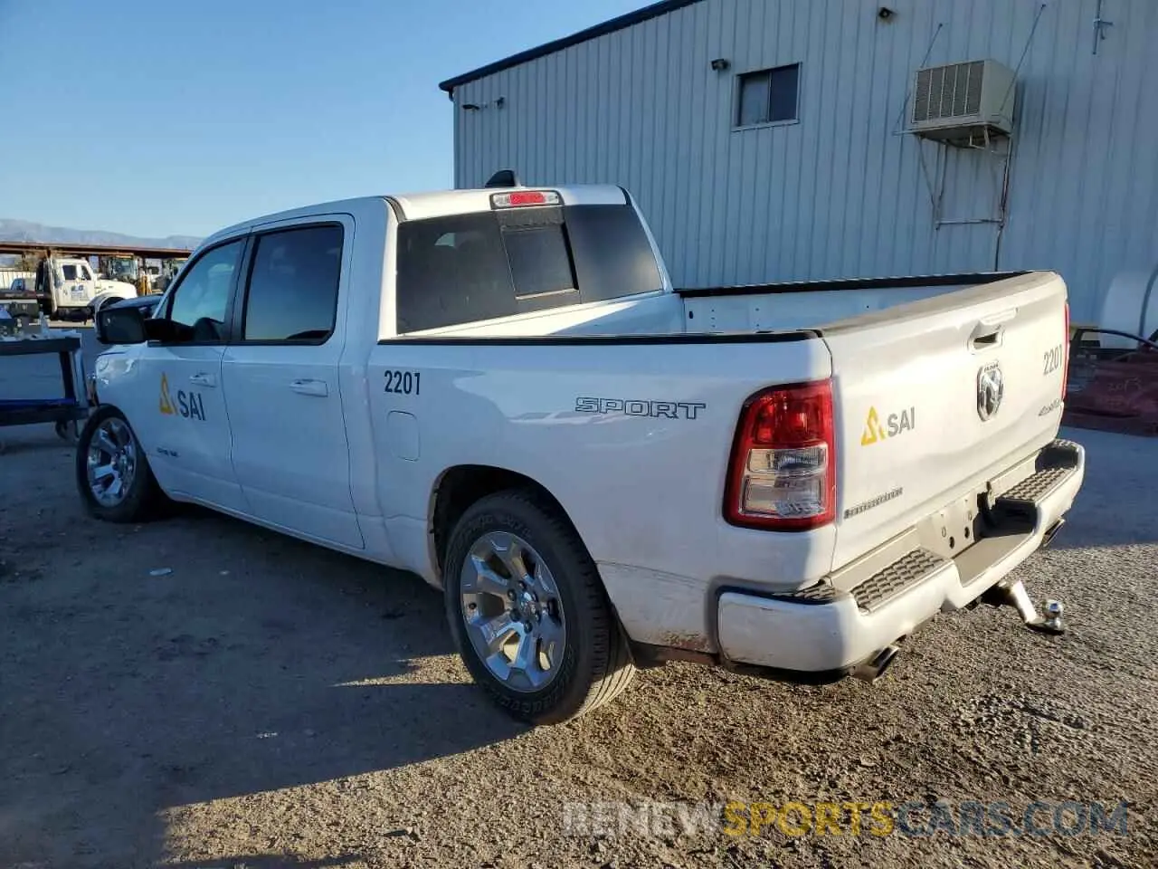 2 Photograph of a damaged car 1C6SRFFT7PN673195 RAM 1500 2023