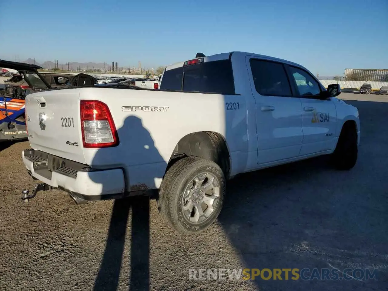 3 Photograph of a damaged car 1C6SRFFT7PN673195 RAM 1500 2023