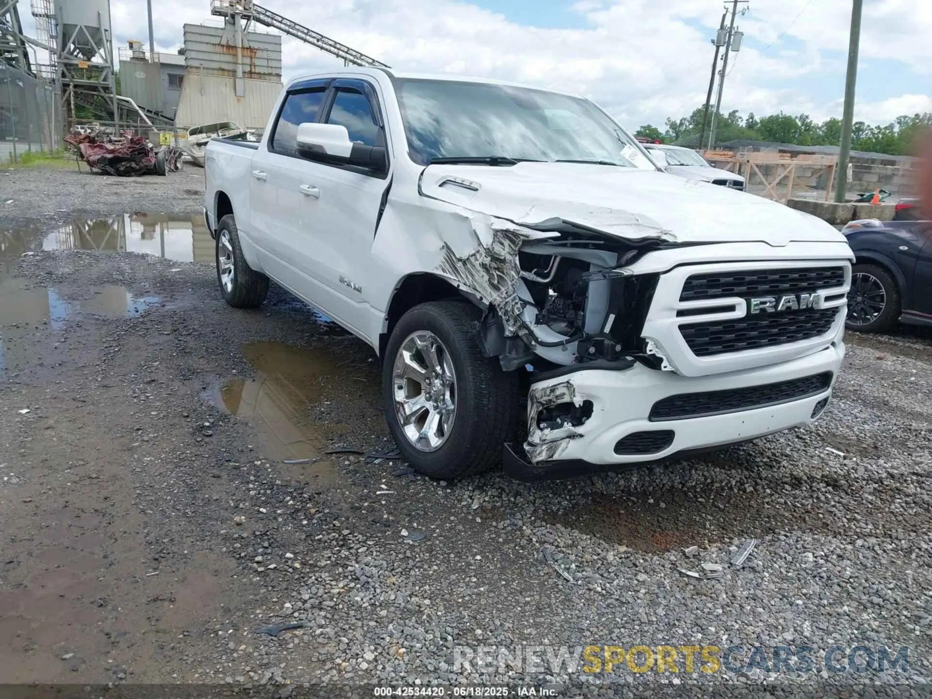 1 Photograph of a damaged car 1C6SRFFT7PN704929 RAM 1500 2023