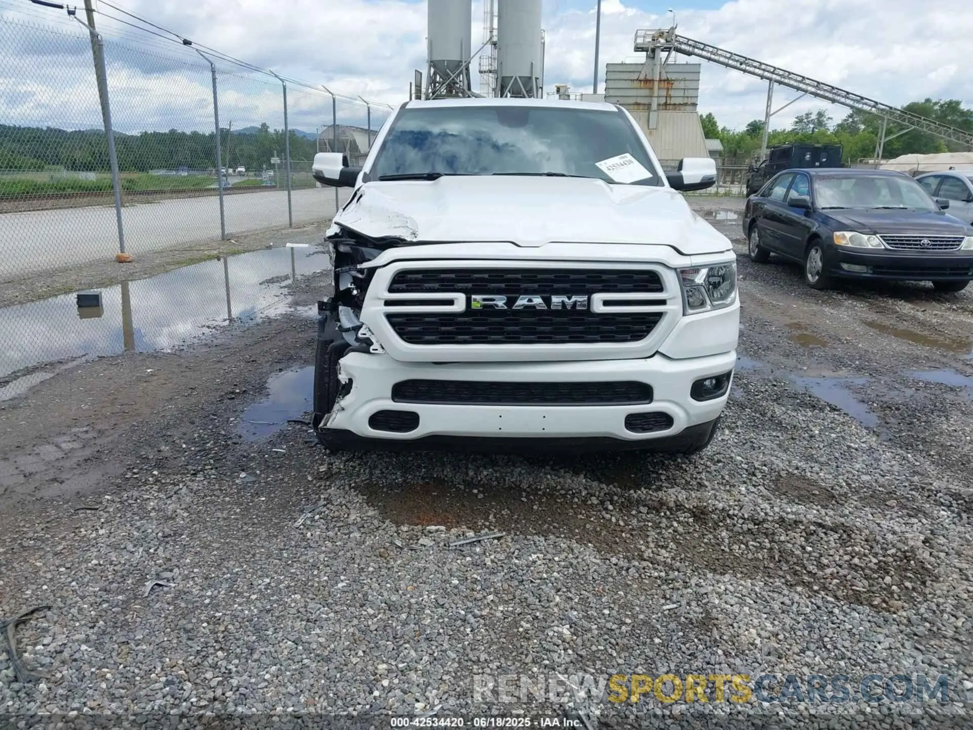 12 Photograph of a damaged car 1C6SRFFT7PN704929 RAM 1500 2023