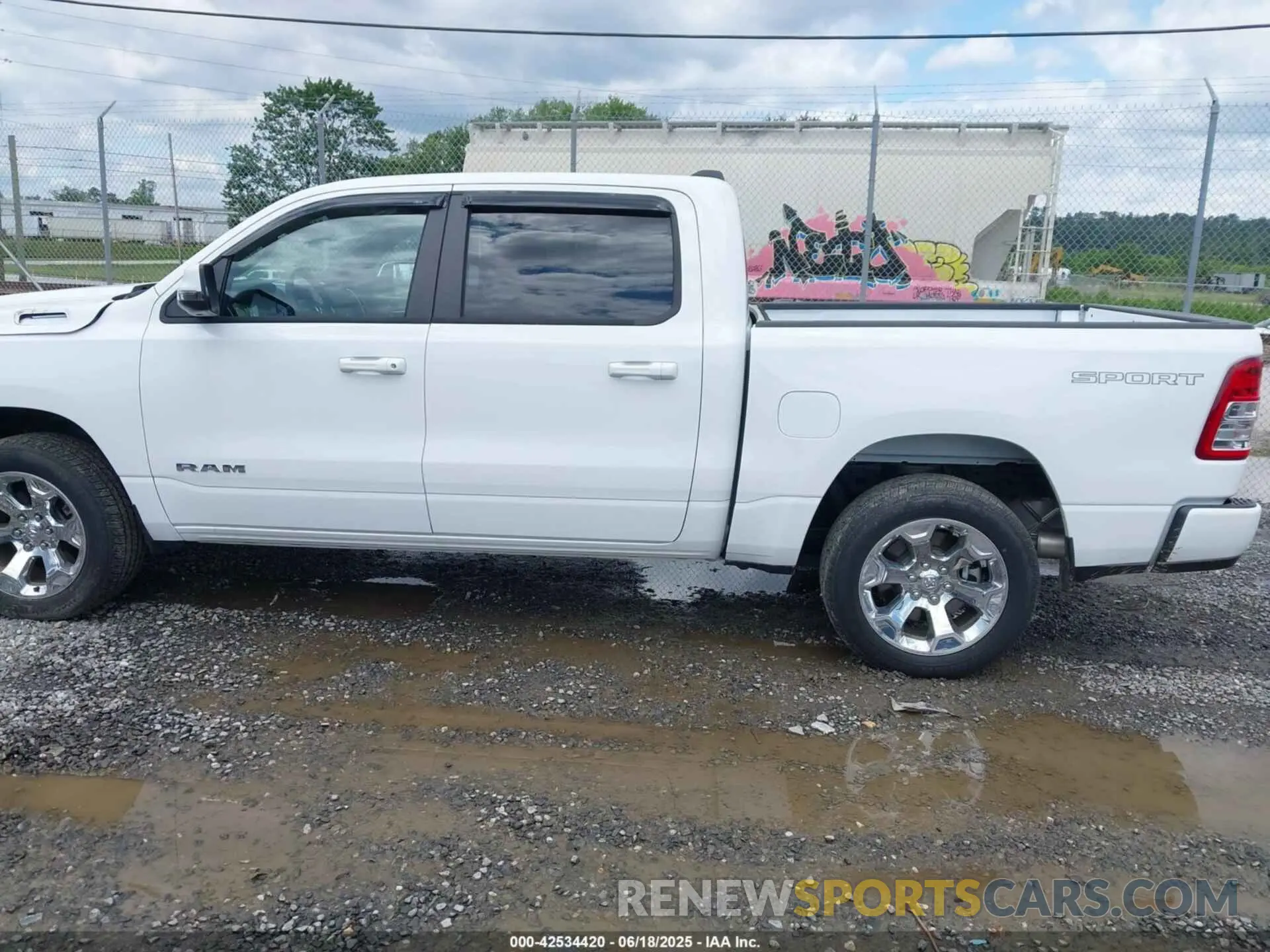 14 Photograph of a damaged car 1C6SRFFT7PN704929 RAM 1500 2023