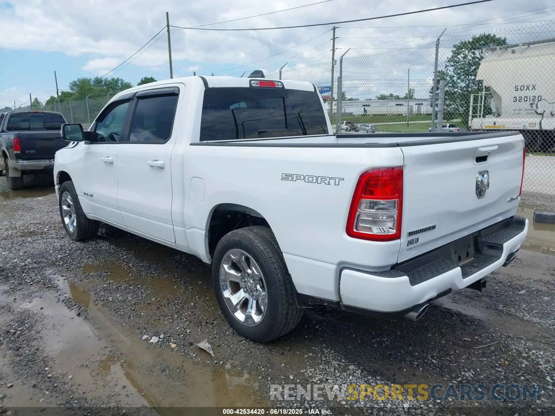 3 Photograph of a damaged car 1C6SRFFT7PN704929 RAM 1500 2023