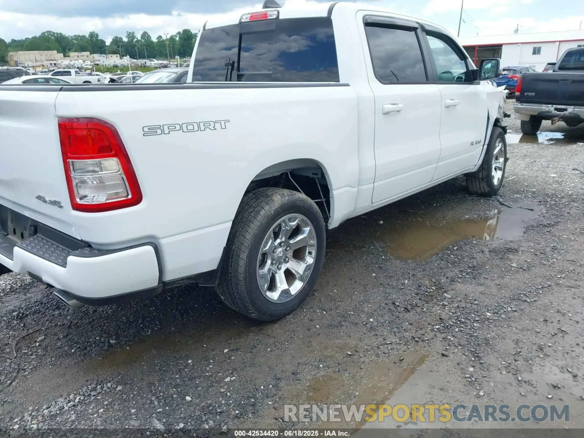 4 Photograph of a damaged car 1C6SRFFT7PN704929 RAM 1500 2023