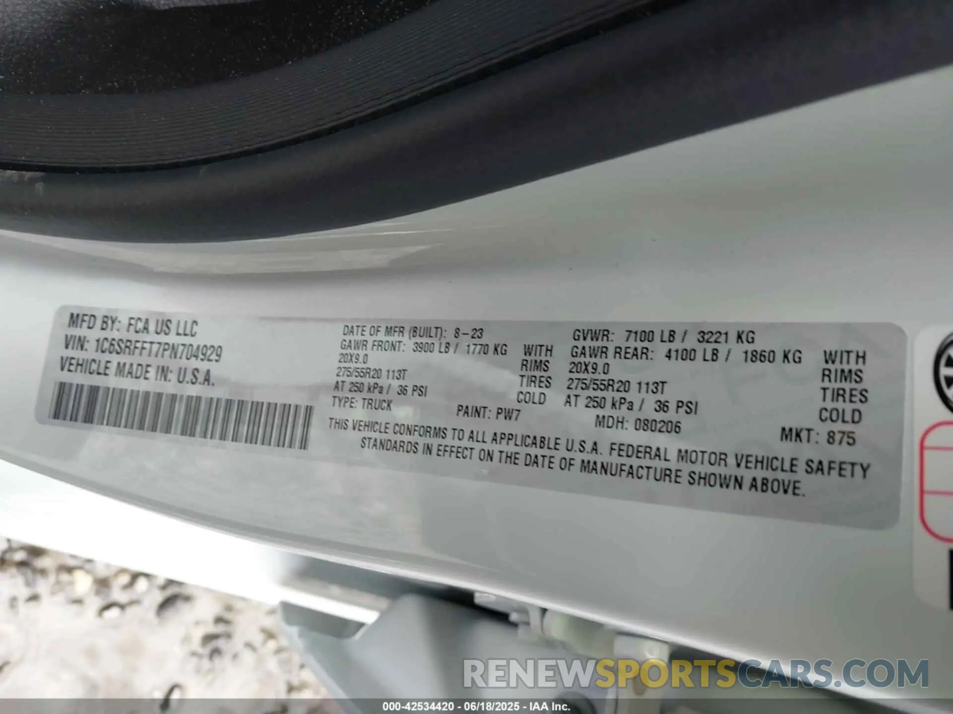 9 Photograph of a damaged car 1C6SRFFT7PN704929 RAM 1500 2023