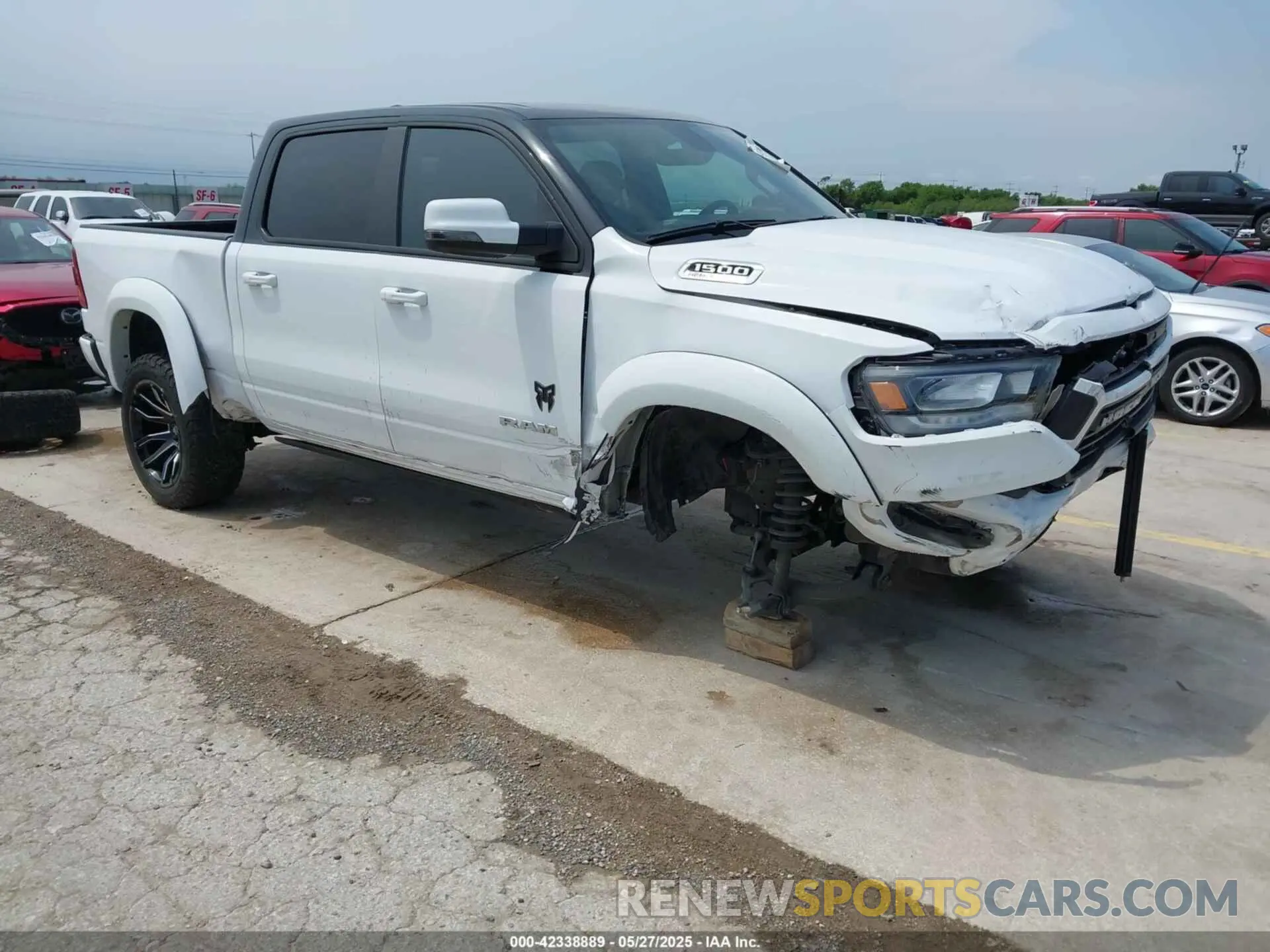 1 Photograph of a damaged car 1C6SRFFT8PN533415 RAM 1500 2023